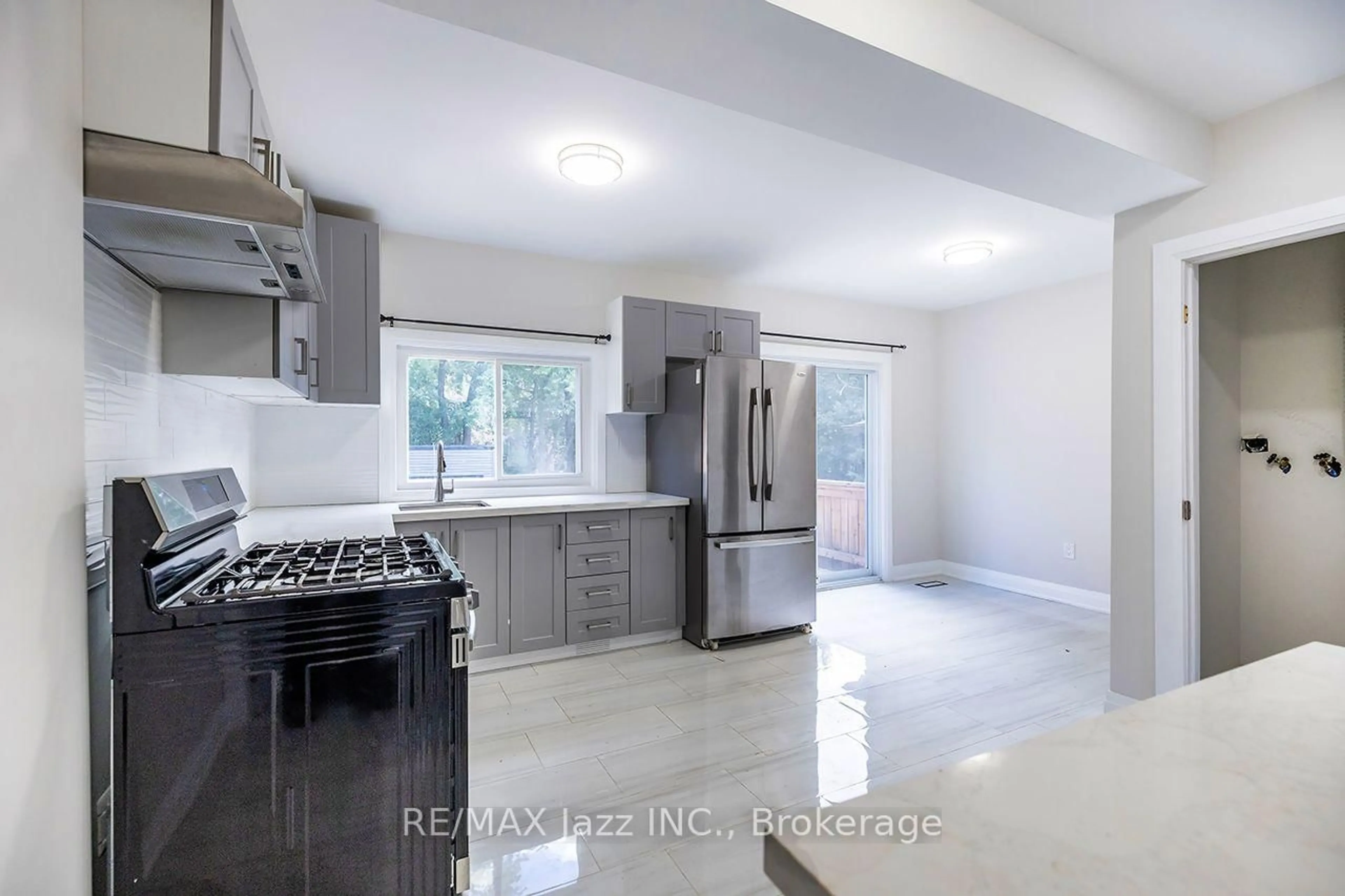Open concept kitchen, ceramic/tile floor for 37 Lincoln St, Ajax Ontario L1S 6C4
