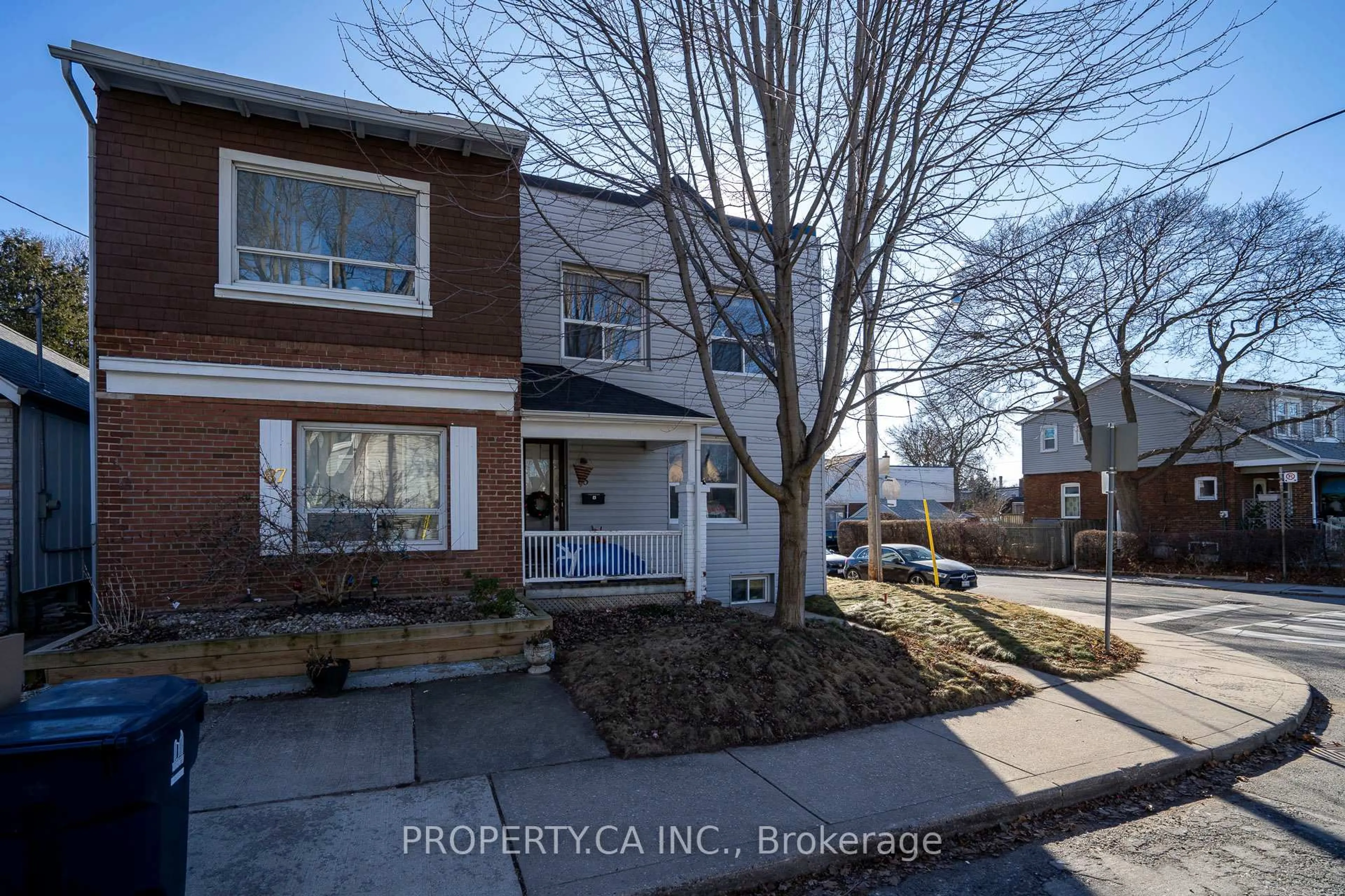 A pic from outside/outdoor area/front of a property/back of a property/a pic from drone, street for 133 Drayton Ave, Toronto Ontario M4C 3L8