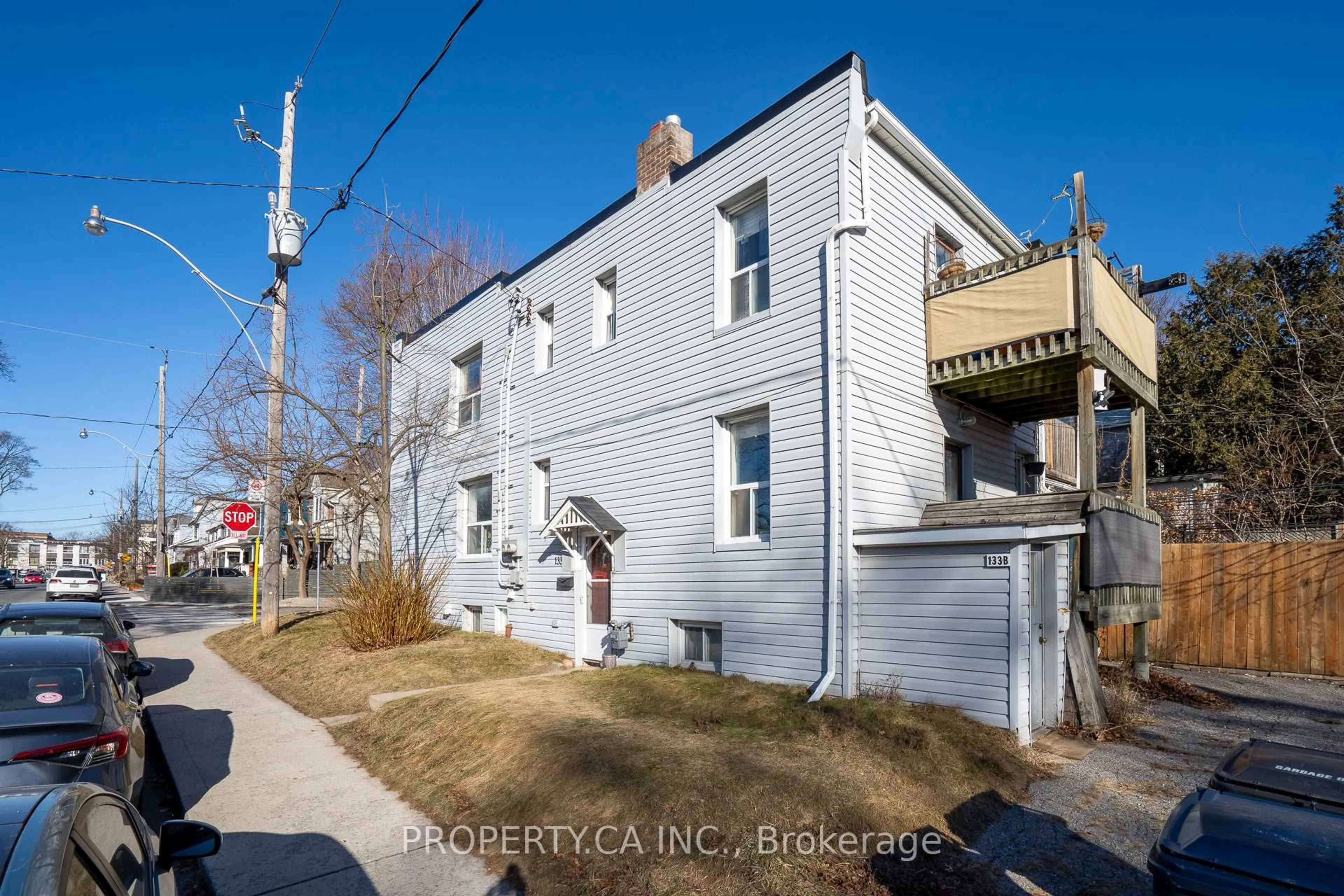 A pic from outside/outdoor area/front of a property/back of a property/a pic from drone, street for 133 Drayton Ave, Toronto Ontario M4C 3L8