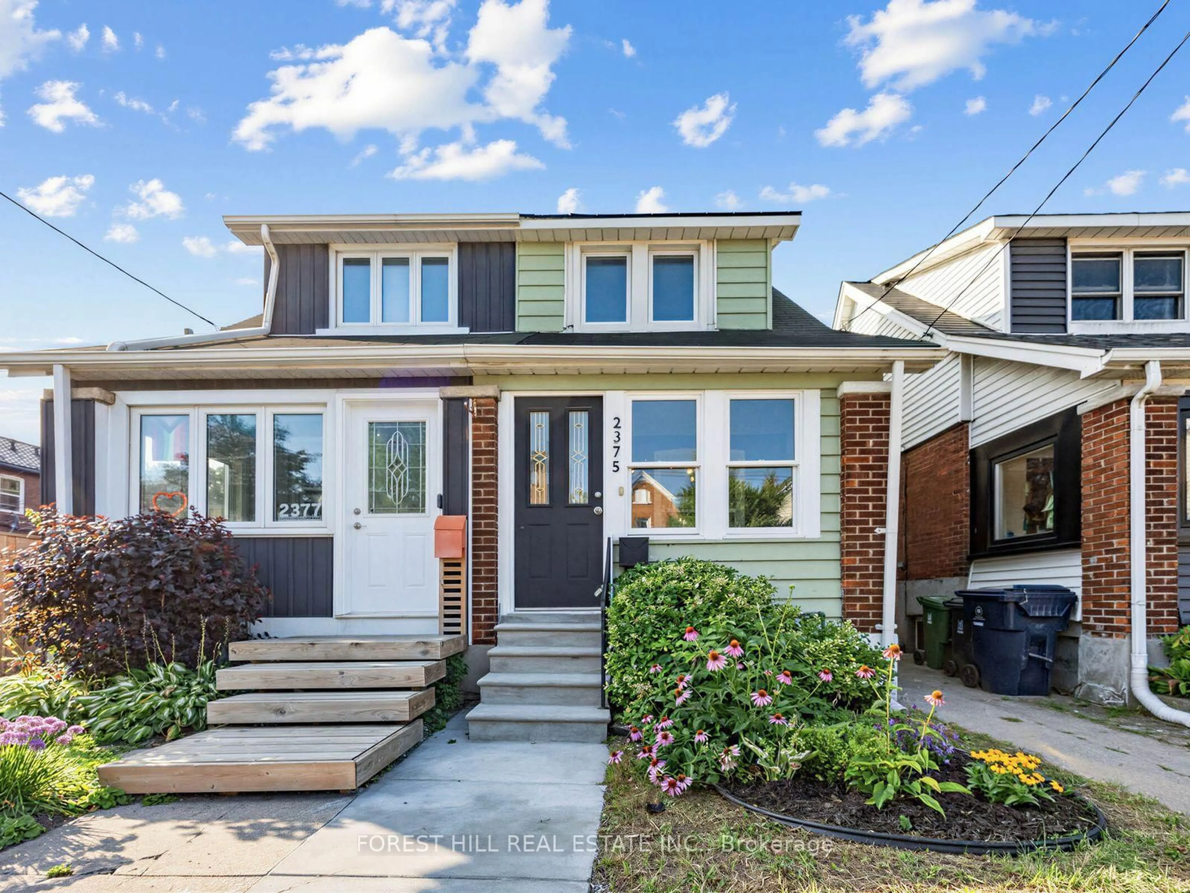 Home with brick exterior material, street for 2375 Gerrard St, Toronto Ontario M4E 2E7