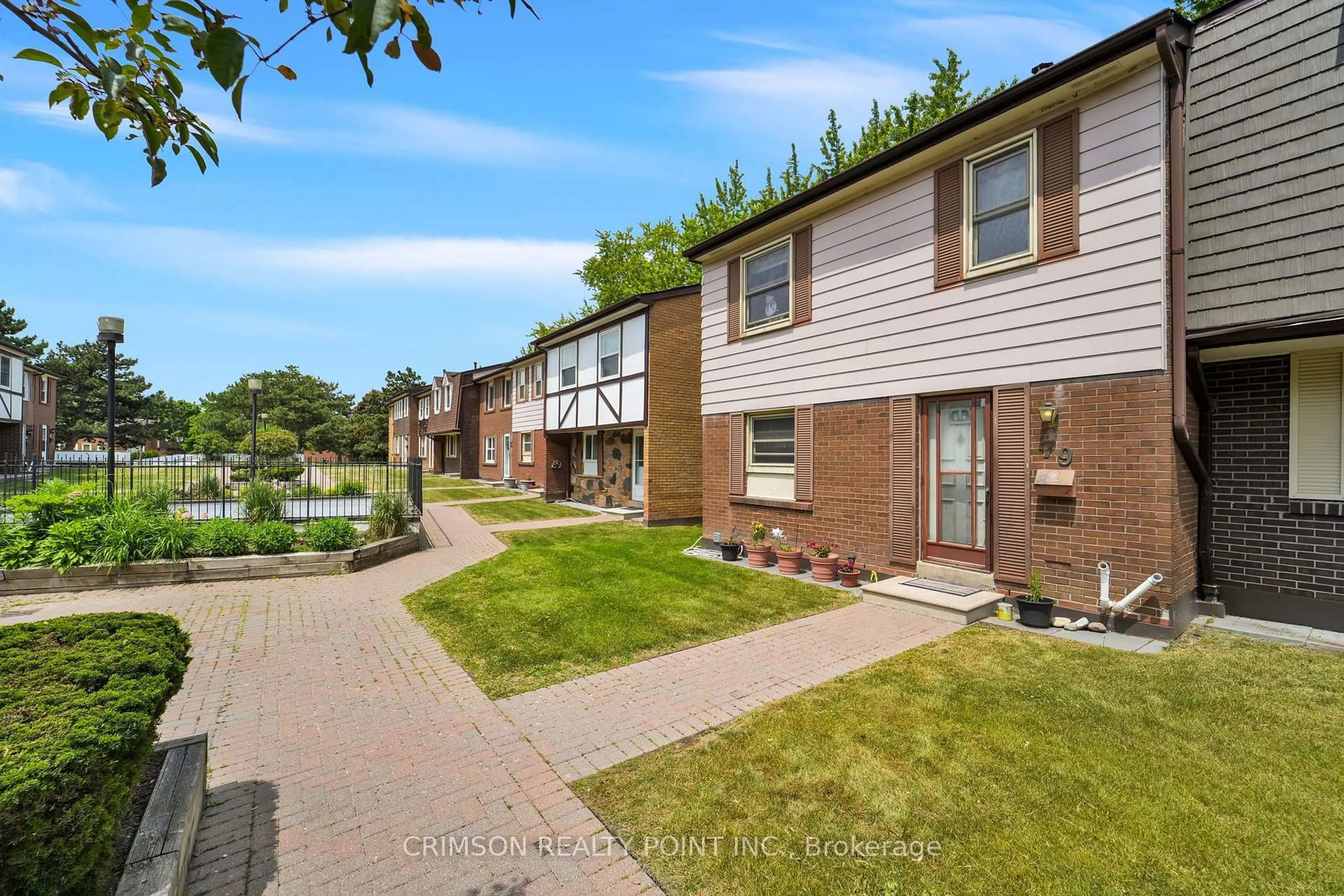 A pic from outside/outdoor area/front of a property/back of a property/a pic from drone, street for 25 Brimwood Blvd #79, Toronto Ontario M1V 1E2