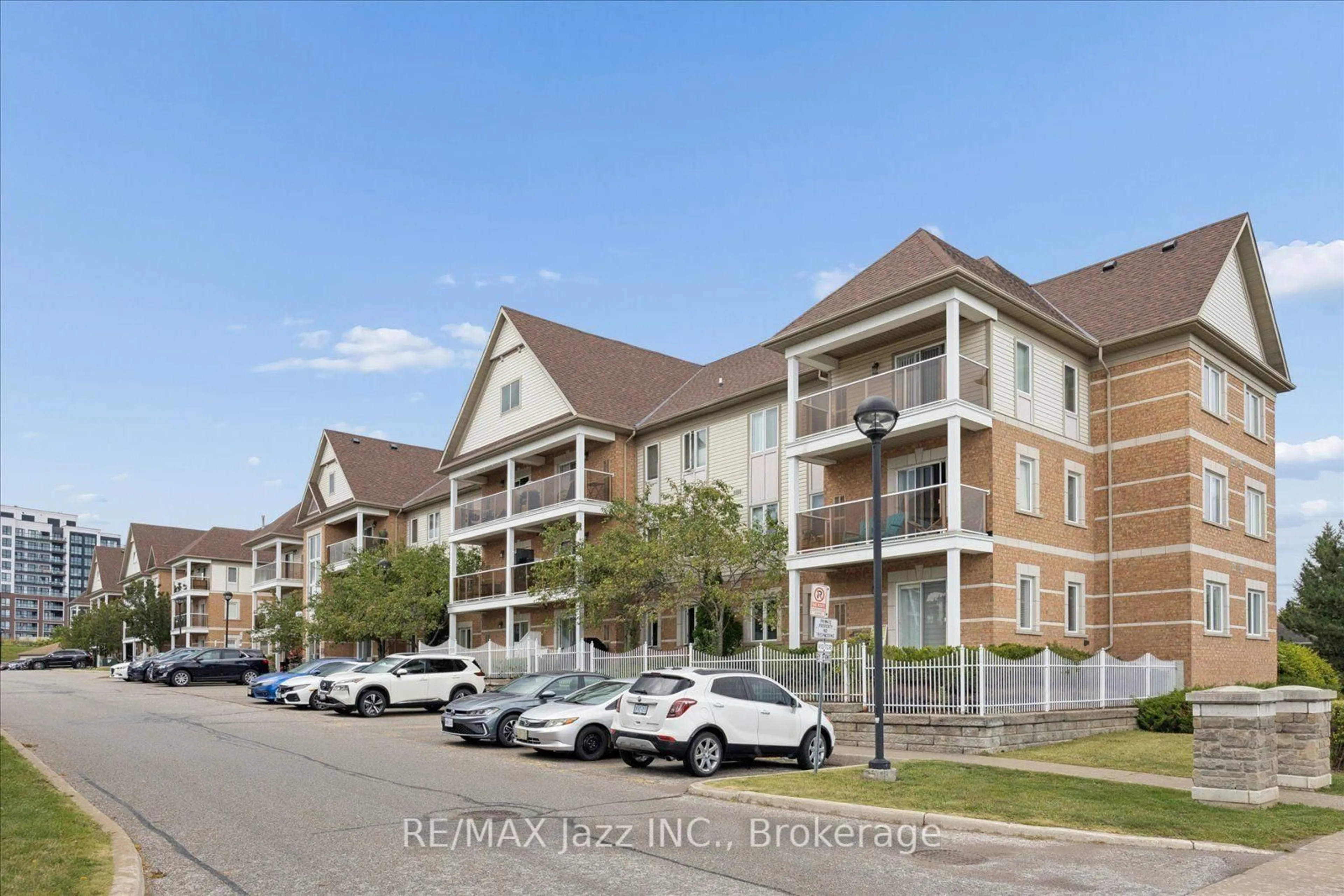 A pic from outside/outdoor area/front of a property/back of a property/a pic from drone, unknown for 120 Aspen Springs Dr #204, Clarington Ontario L1C 0G7