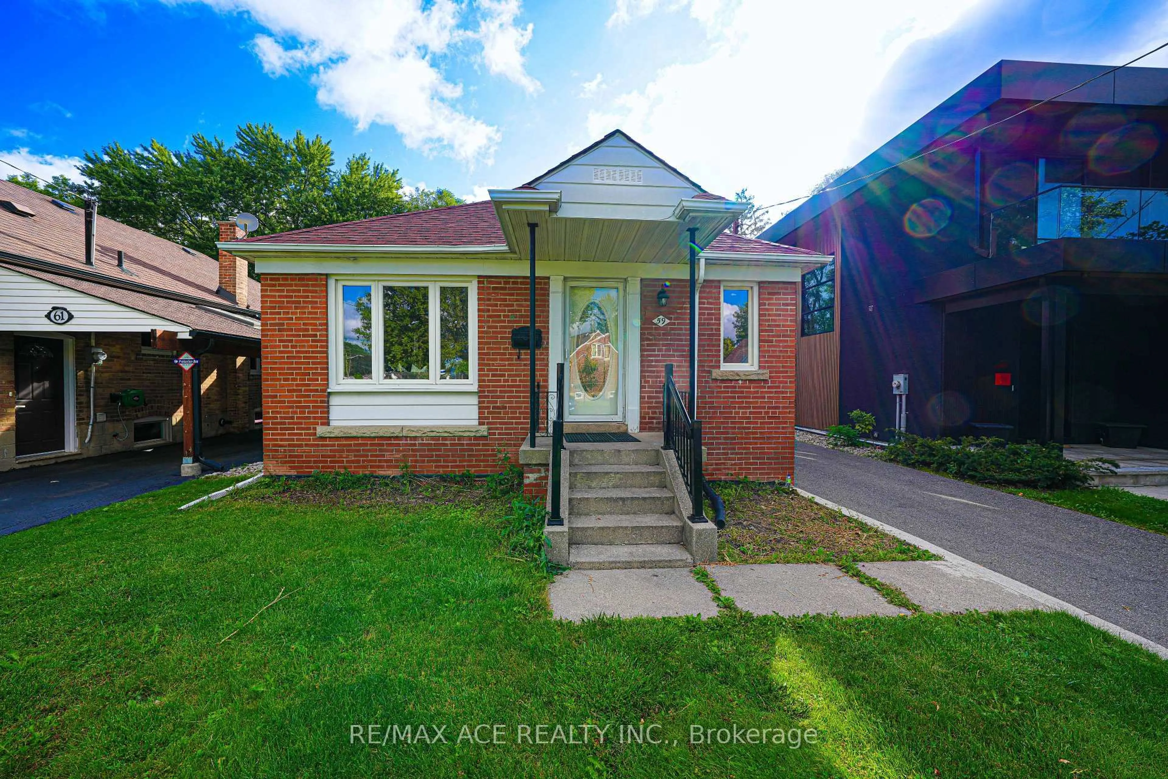 Home with brick exterior material, street for 59 Lilian Dr, Toronto Ontario M1R 3W4