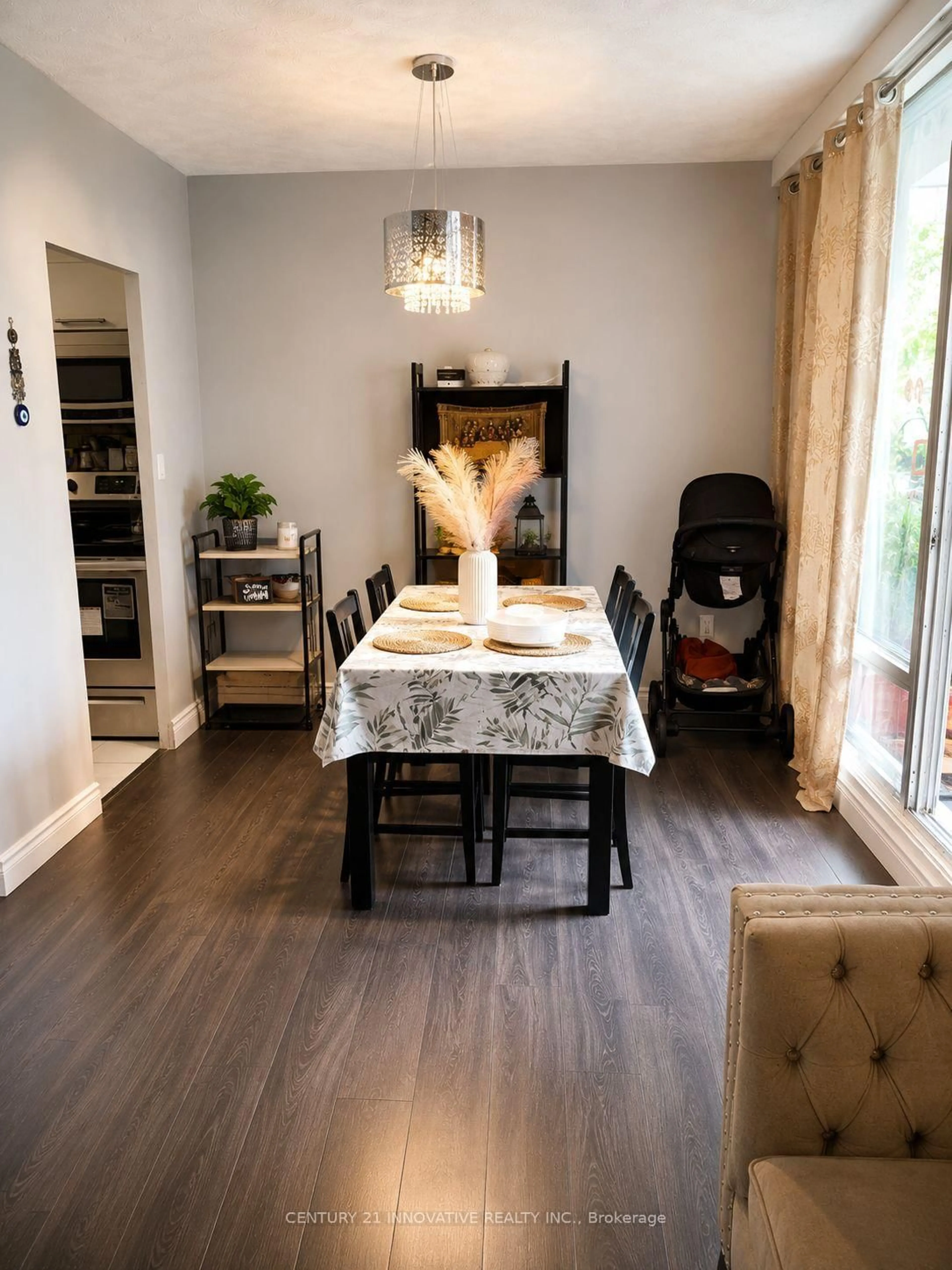 Dining room, wood/laminate floor for 1 Massey Sq #609, Toronto Ontario M4C 5L4