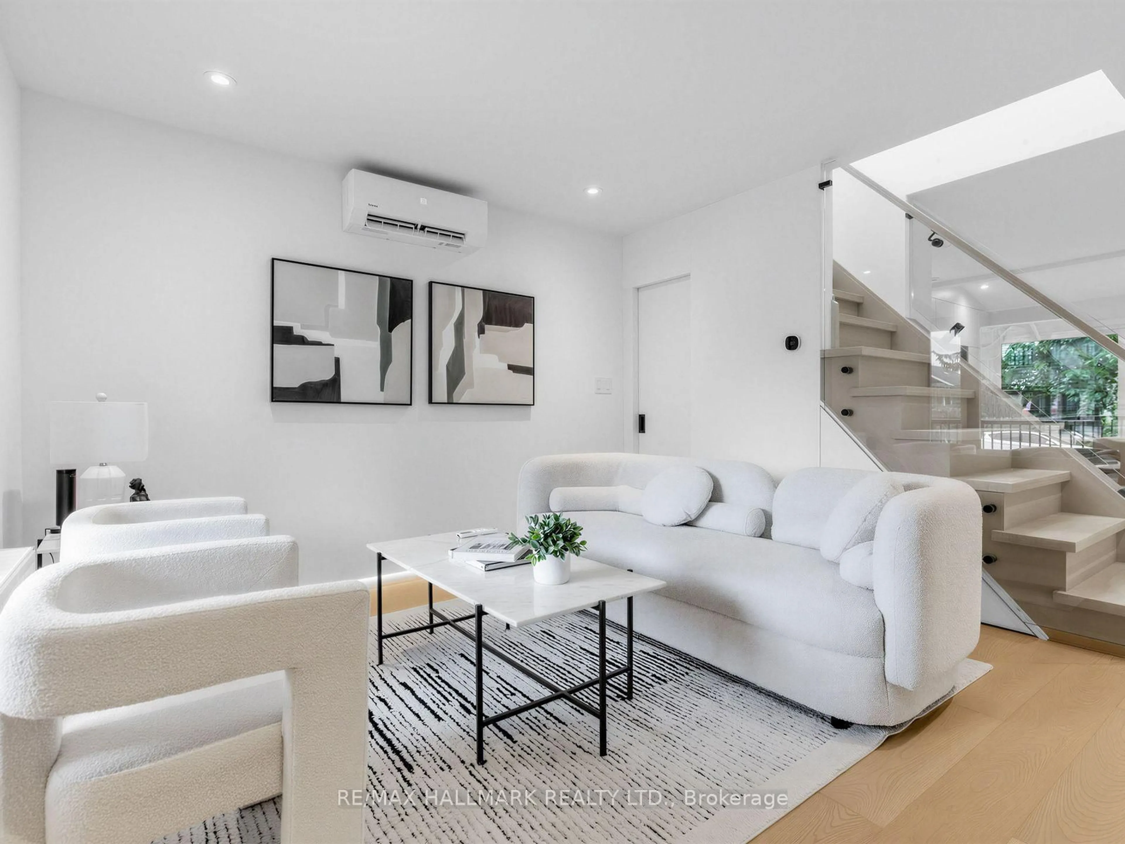 Living room with furniture, unknown for 227 Donlands Ave, Toronto Ontario M4J 3P9