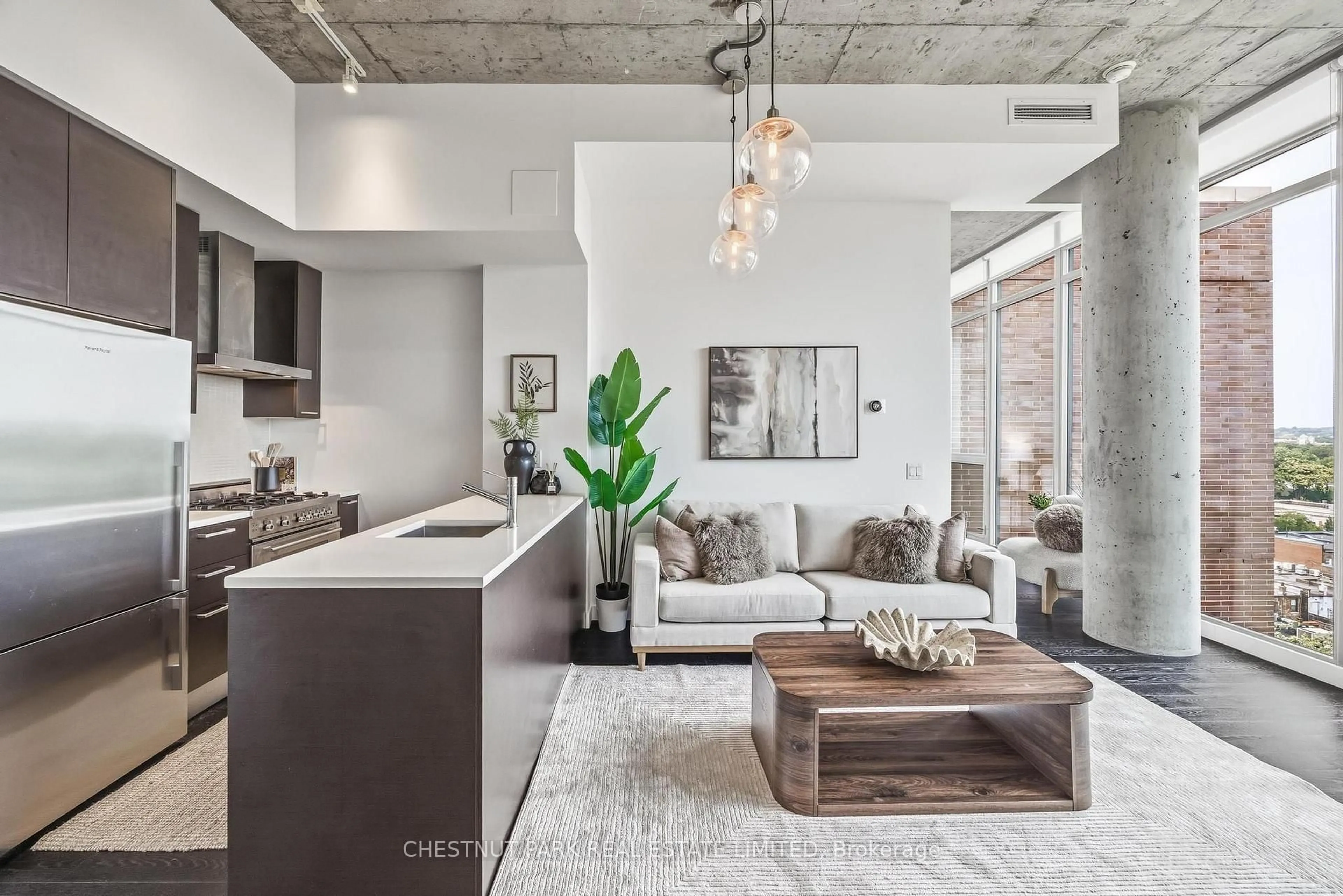 Open concept kitchen, cement floor for 90 Broadview Ave #901, Toronto Ontario M4M 0A7