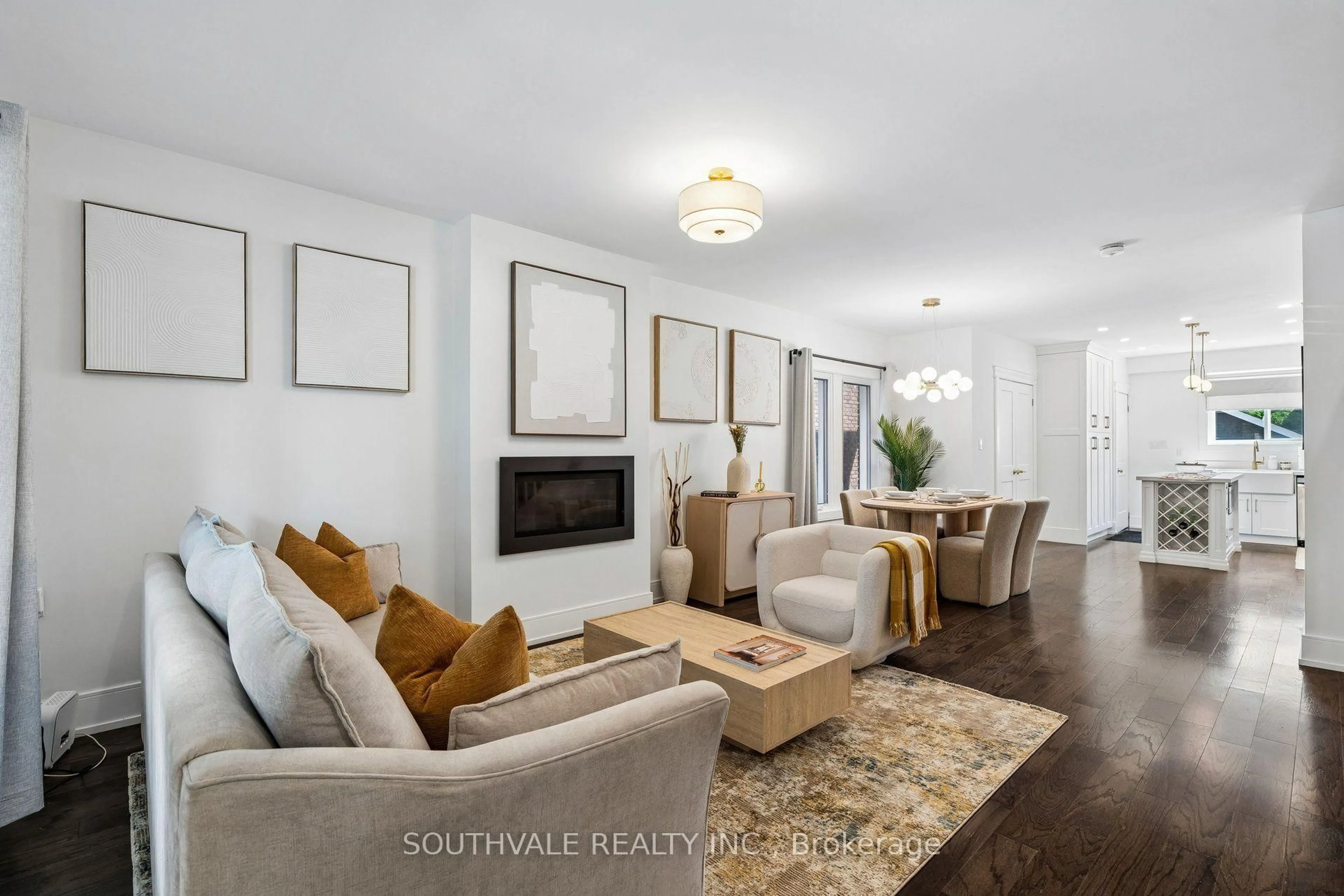 Living room with furniture, unknown for 485 Strathmore Blvd, Toronto Ontario M4C 1N8