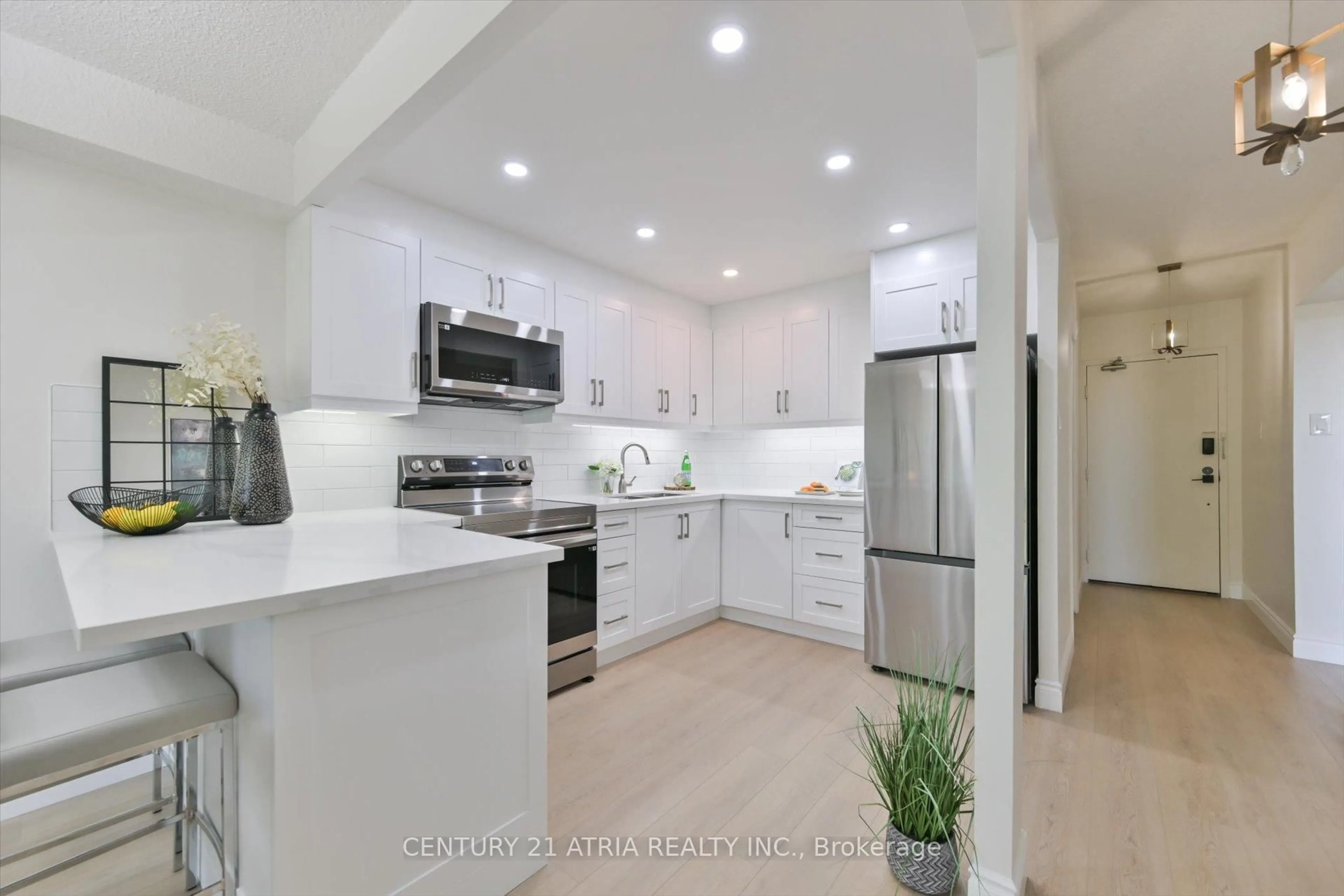 Open concept kitchen, ceramic/tile floor for 4101 Sheppard Ave #207, Toronto Ontario M1S 3H3