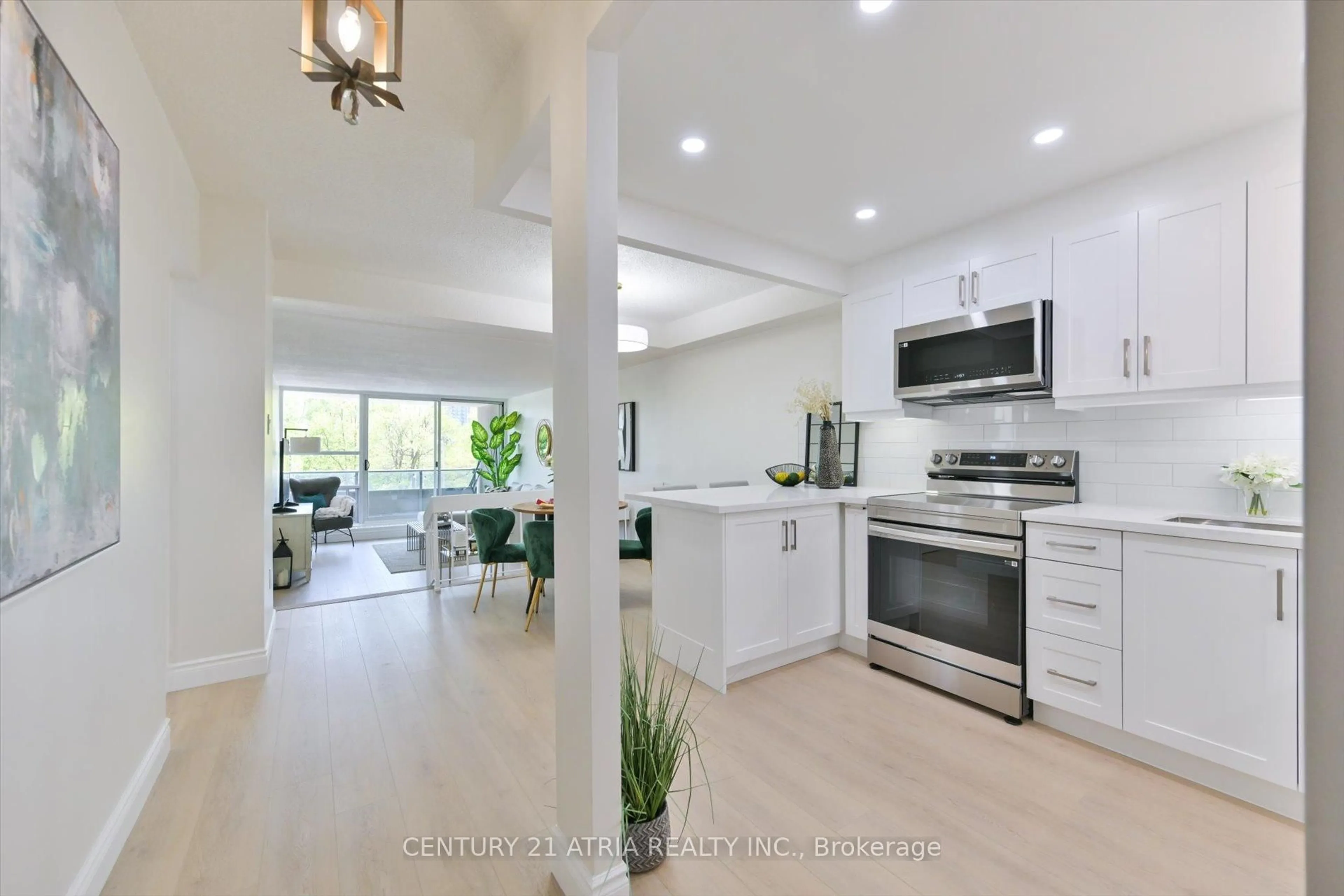 Open concept kitchen, ceramic/tile floor for 4101 Sheppard Ave #207, Toronto Ontario M1S 3H3