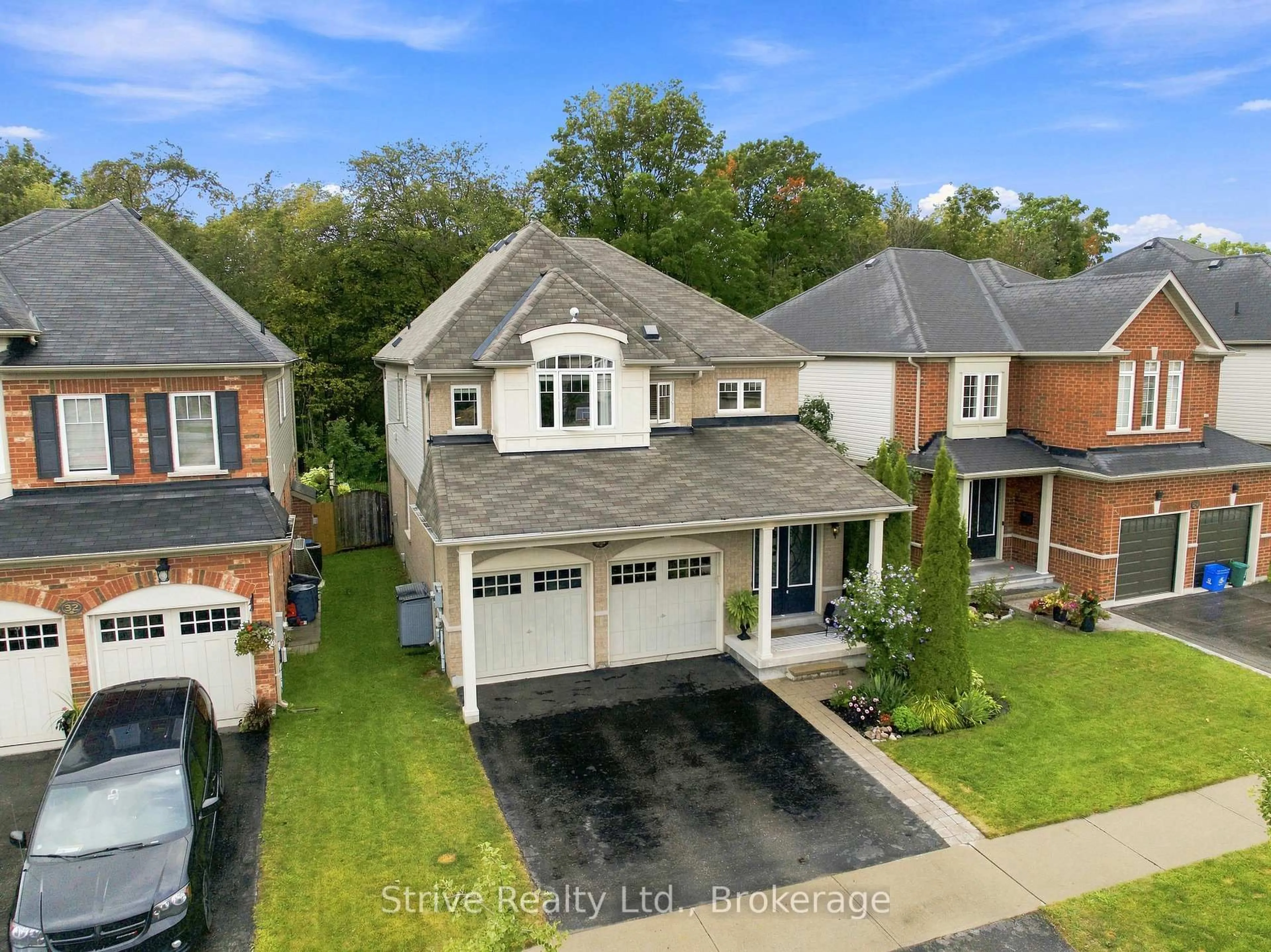 A pic from outside/outdoor area/front of a property/back of a property/a pic from drone, street for 28 Woolacott Lane, Clarington Ontario L1C 0J4