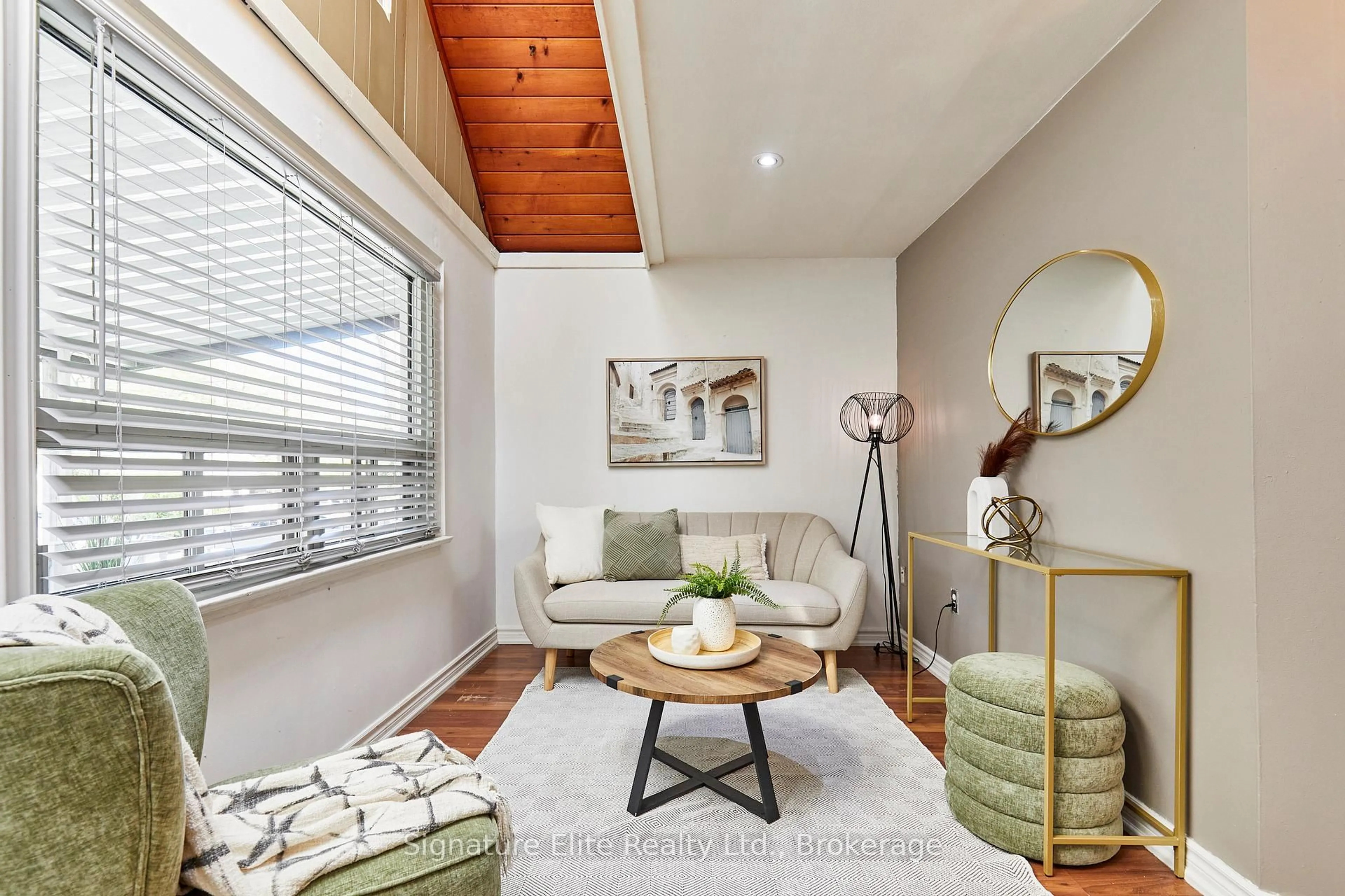 Living room with furniture, wood/laminate floor for 19 Kenworthy Ave, Toronto Ontario M1L 3B1