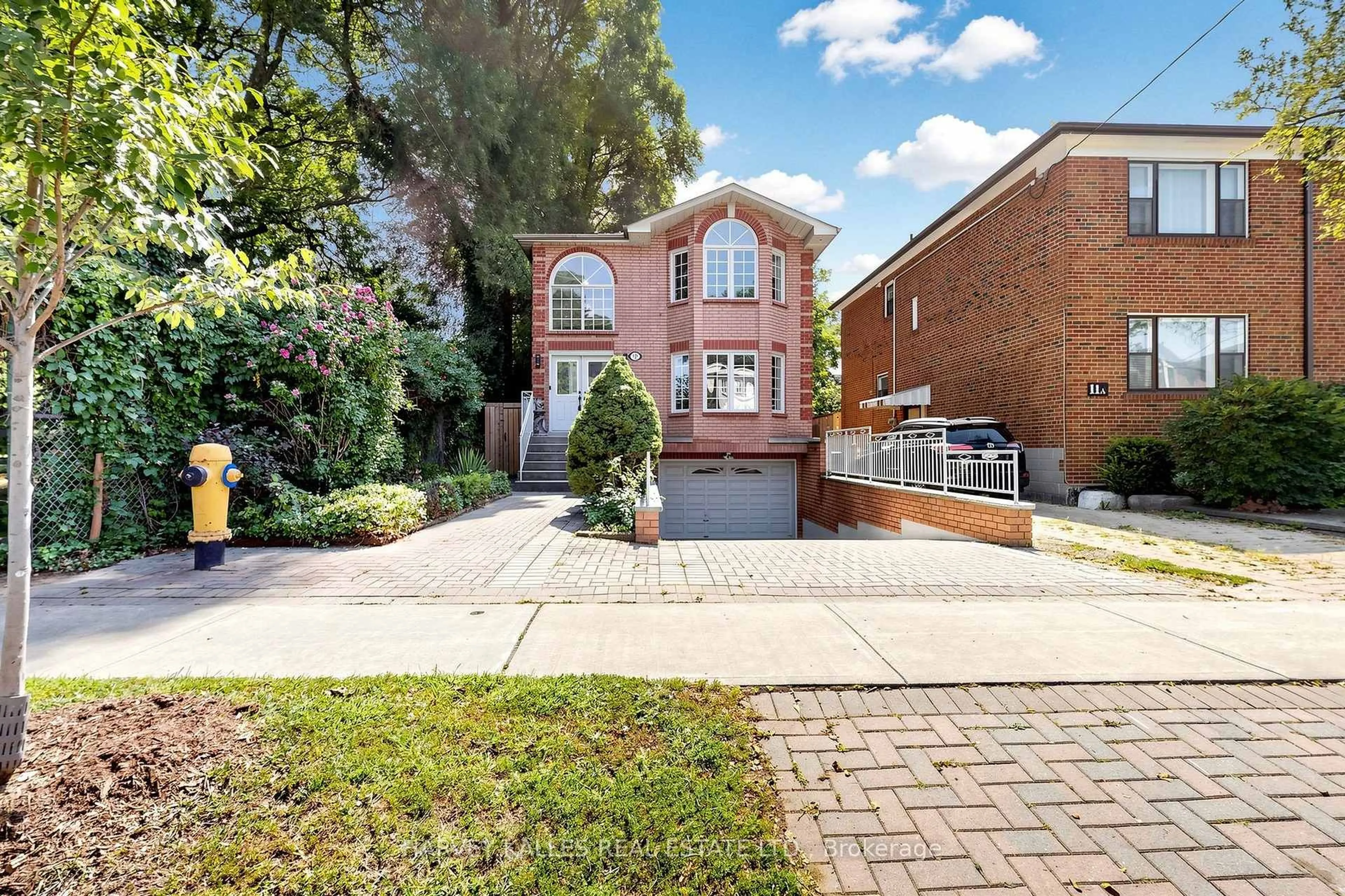 Home with brick exterior material, street for 15 Woodville Ave, Toronto Ontario M4K 2J5