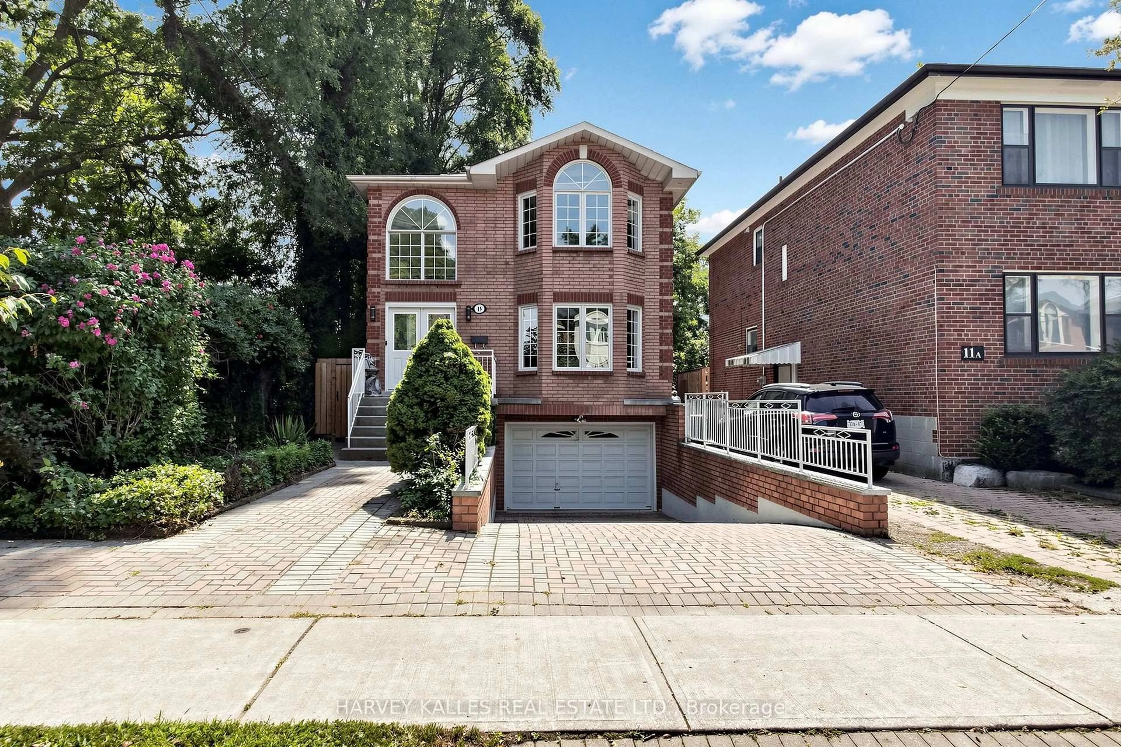 Home with brick exterior material, street for 15 Woodville Ave, Toronto Ontario M4K 2J5
