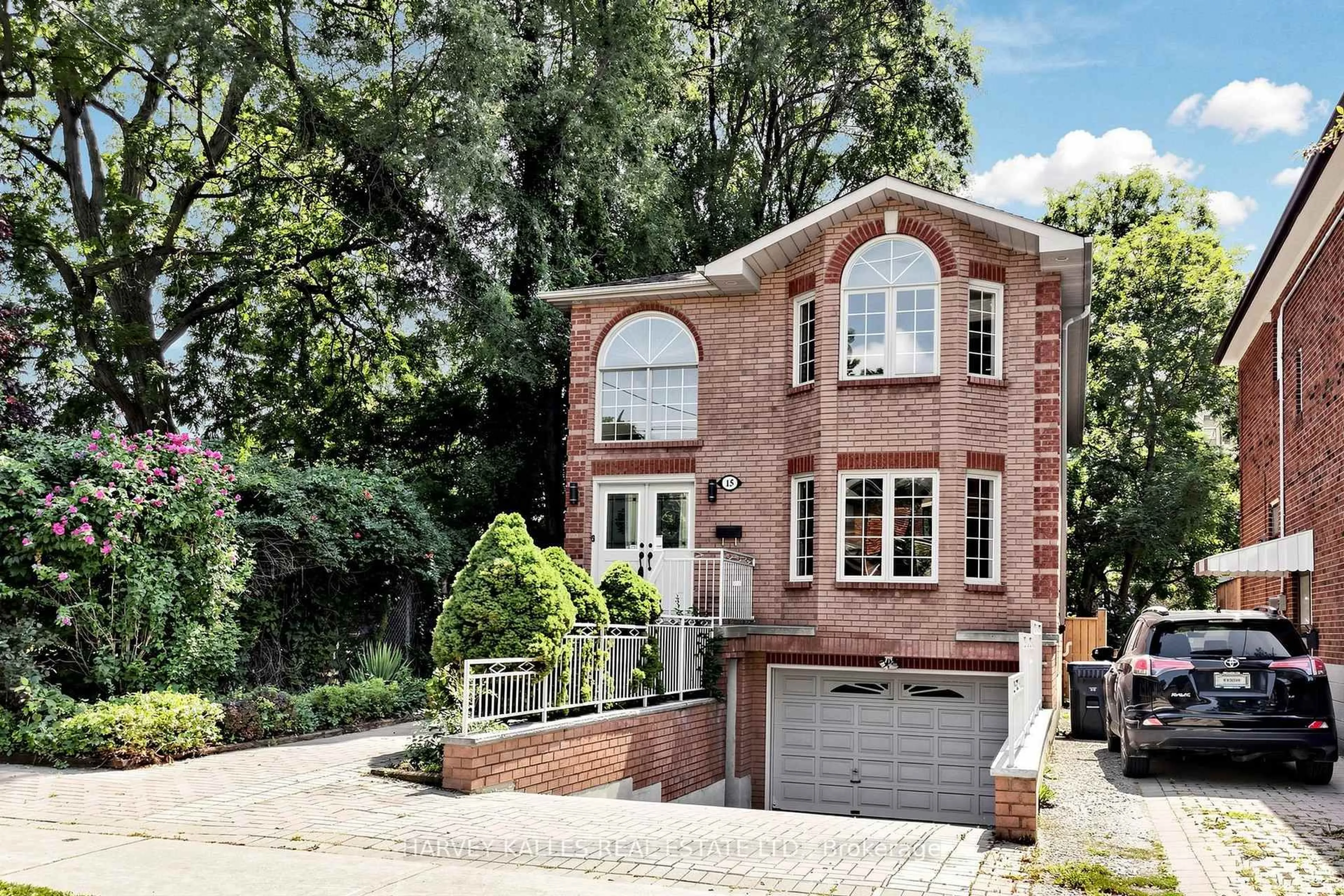 Home with brick exterior material, street for 15 Woodville Ave, Toronto Ontario M4K 2J5