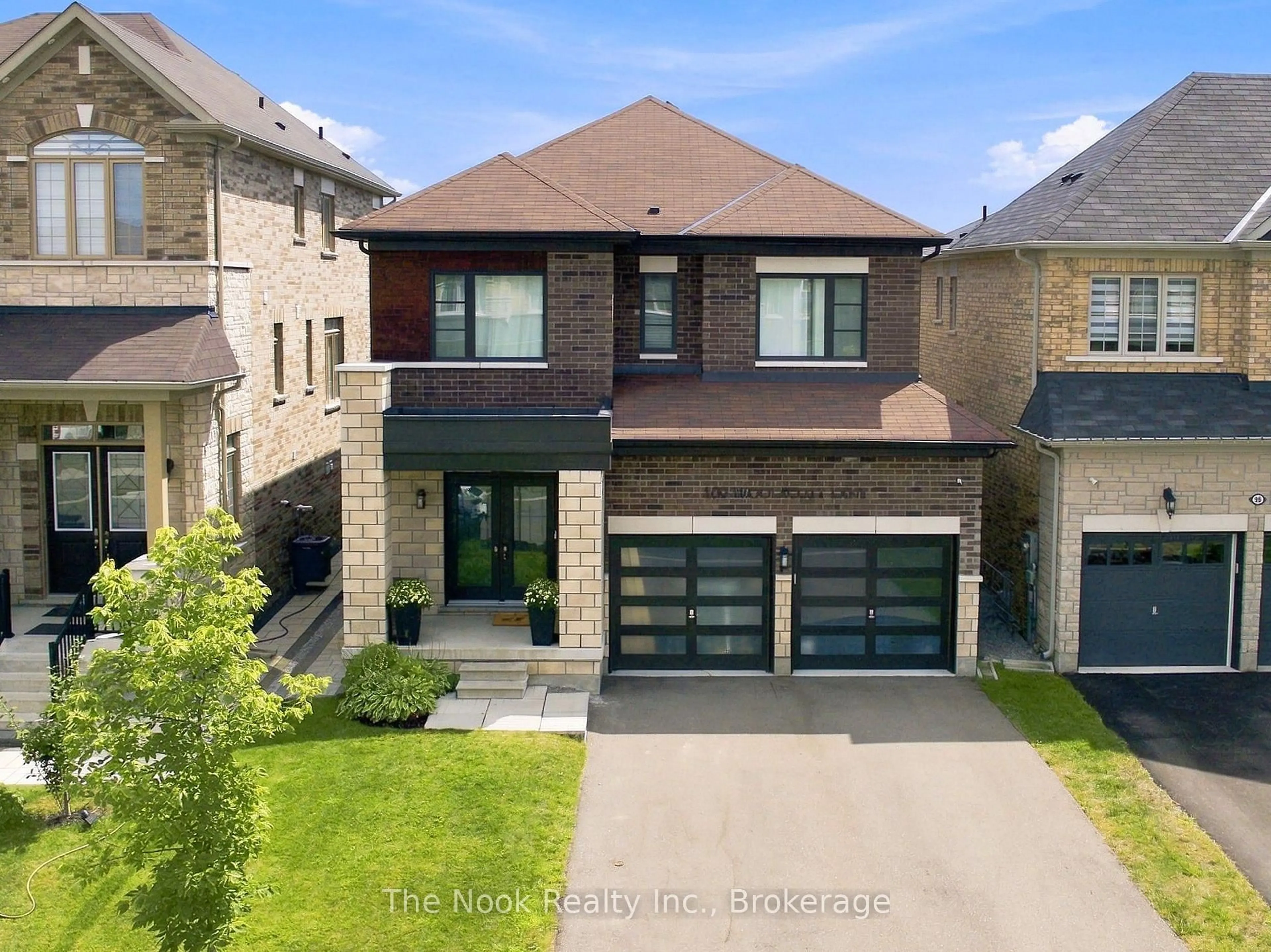 Home with brick exterior material, street for 100 Woolacott Lane, Clarington Ontario L1C 7H1
