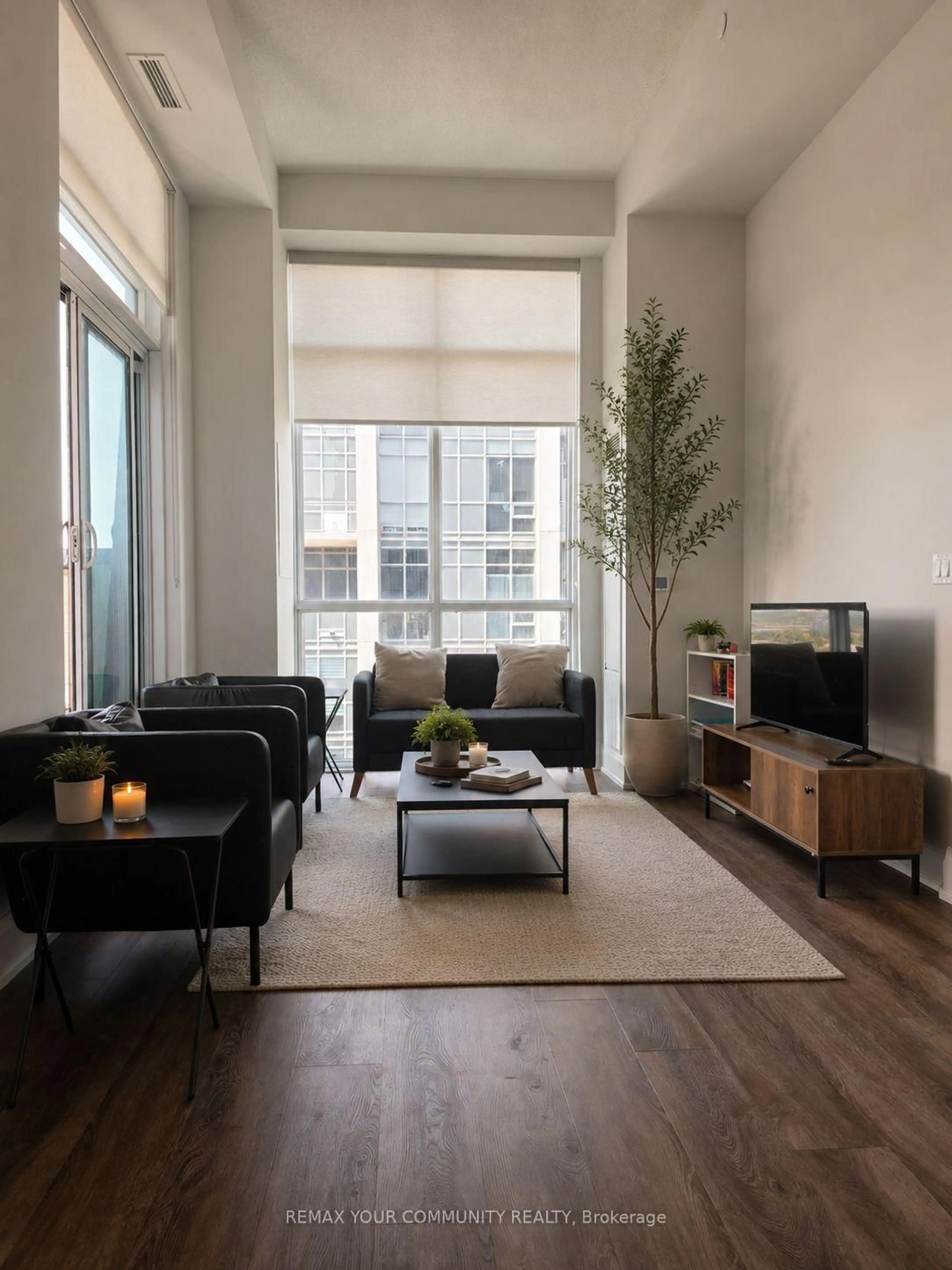 Living room with furniture, unknown for 20 Meadowglen Pl #2808, Toronto Ontario M1G 0A9