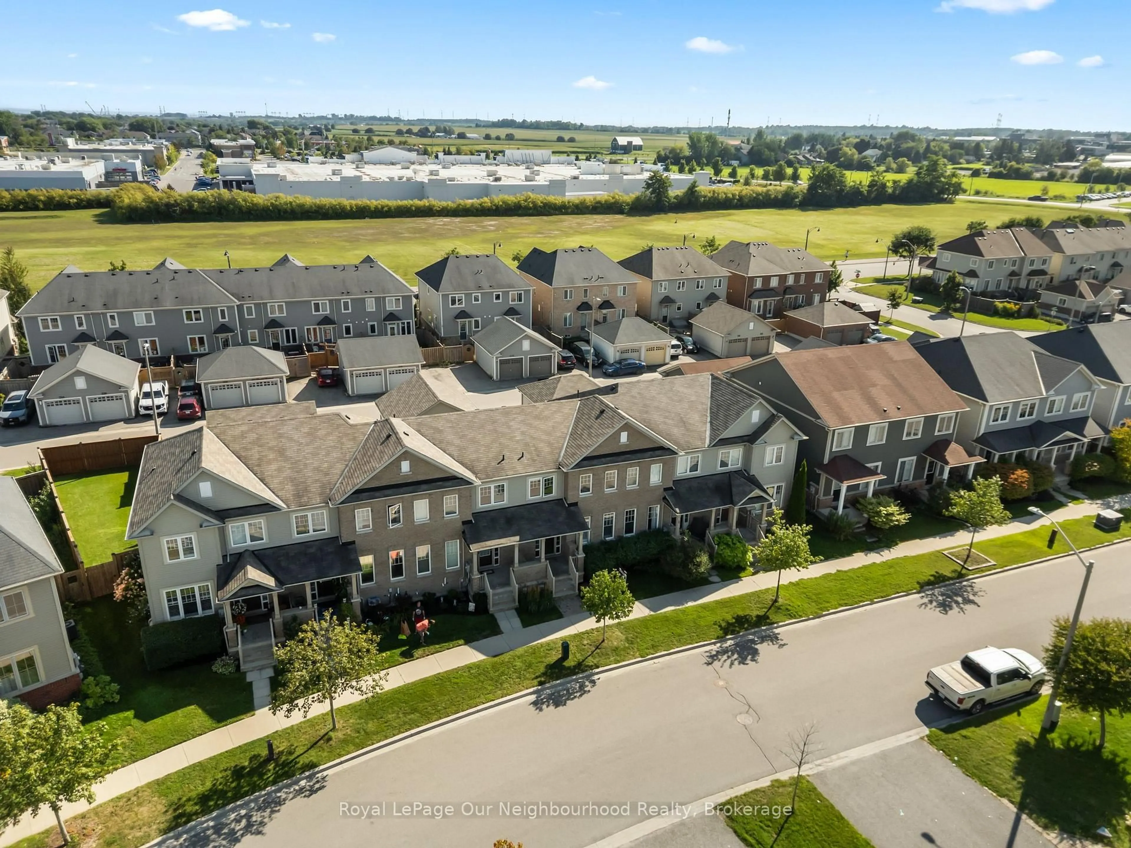 A pic from outside/outdoor area/front of a property/back of a property/a pic from drone, unknown for 83 Ted Miller Cres, Clarington Ontario L1C 0M4