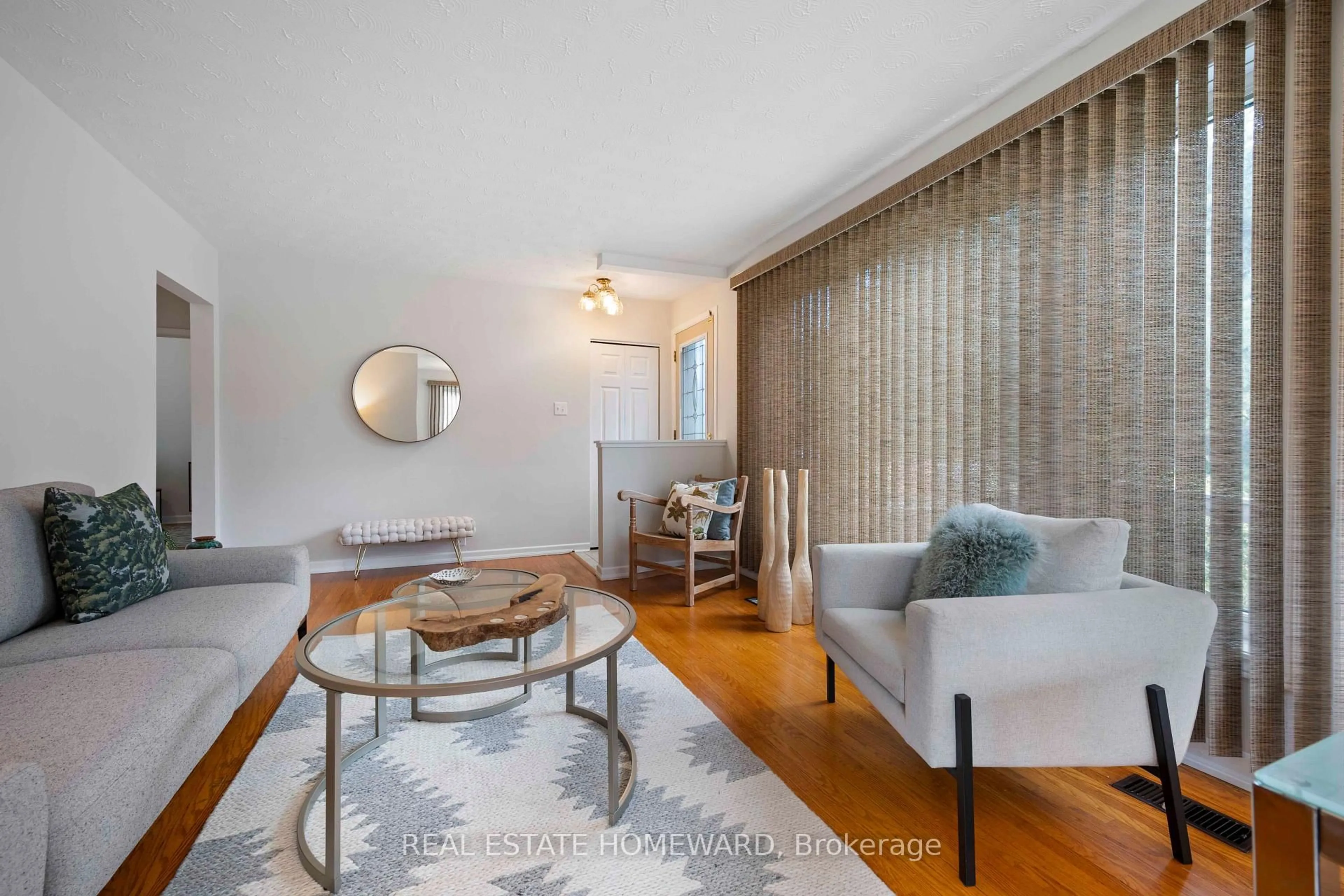 Living room with furniture, wood/laminate floor for 118 Zaph Ave, Toronto Ontario M1C 1M8