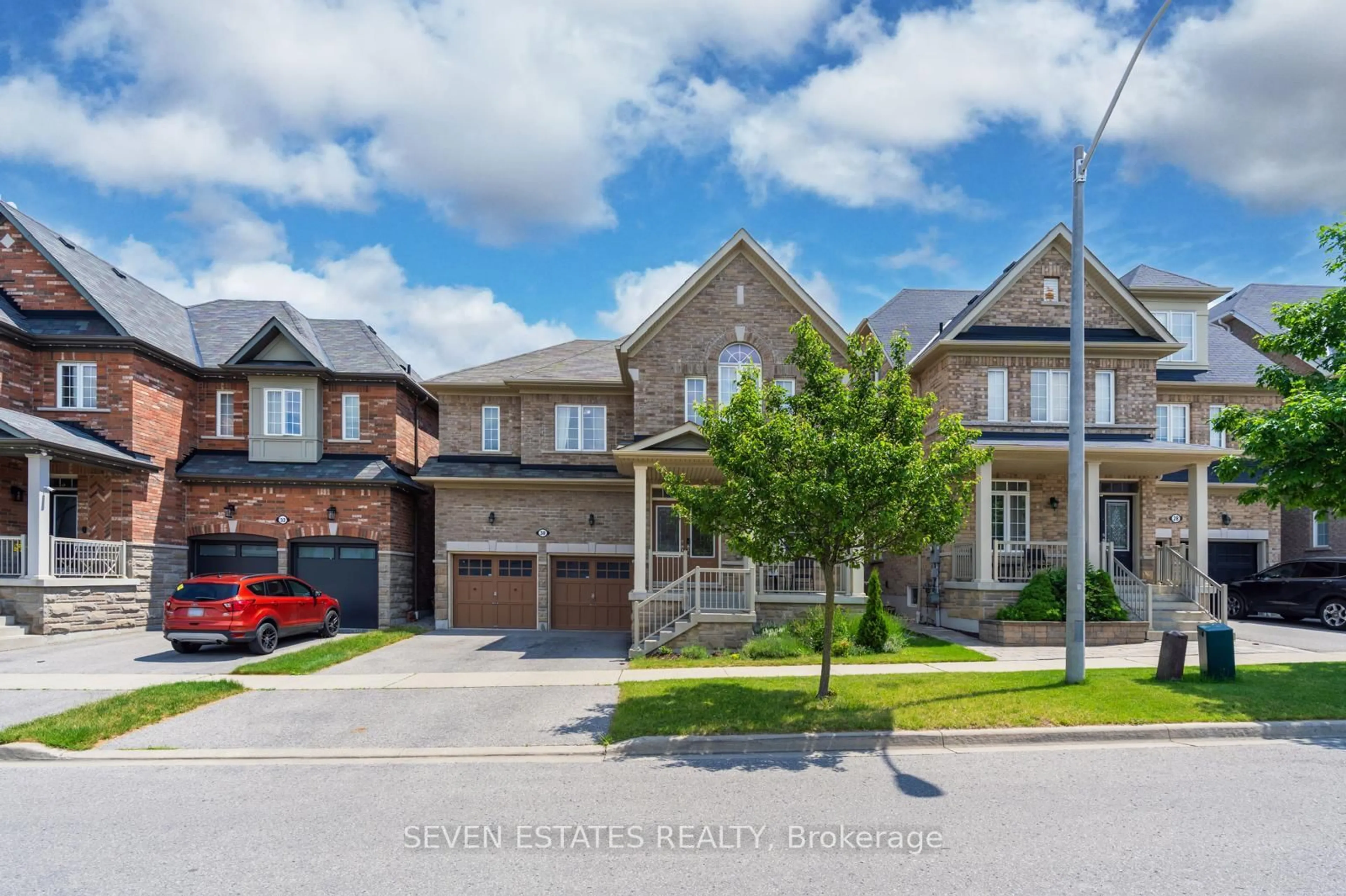 Home with brick exterior material, street for 30 Sheldon Dr, Ajax Ontario L1T 0L9