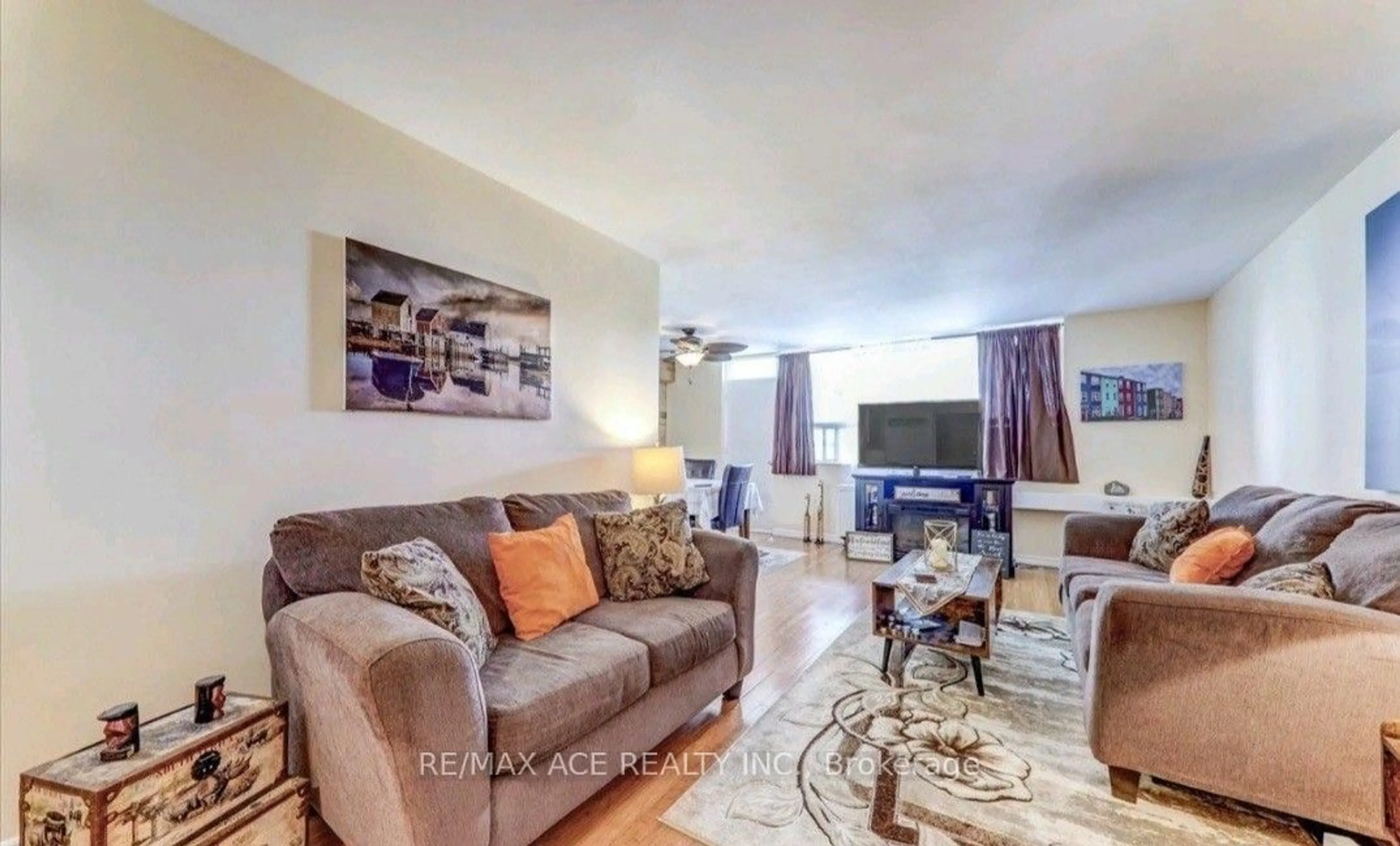 Living room with furniture, unknown for 3420 Eglinton Ave #608, Toronto Ontario M1J 2H9