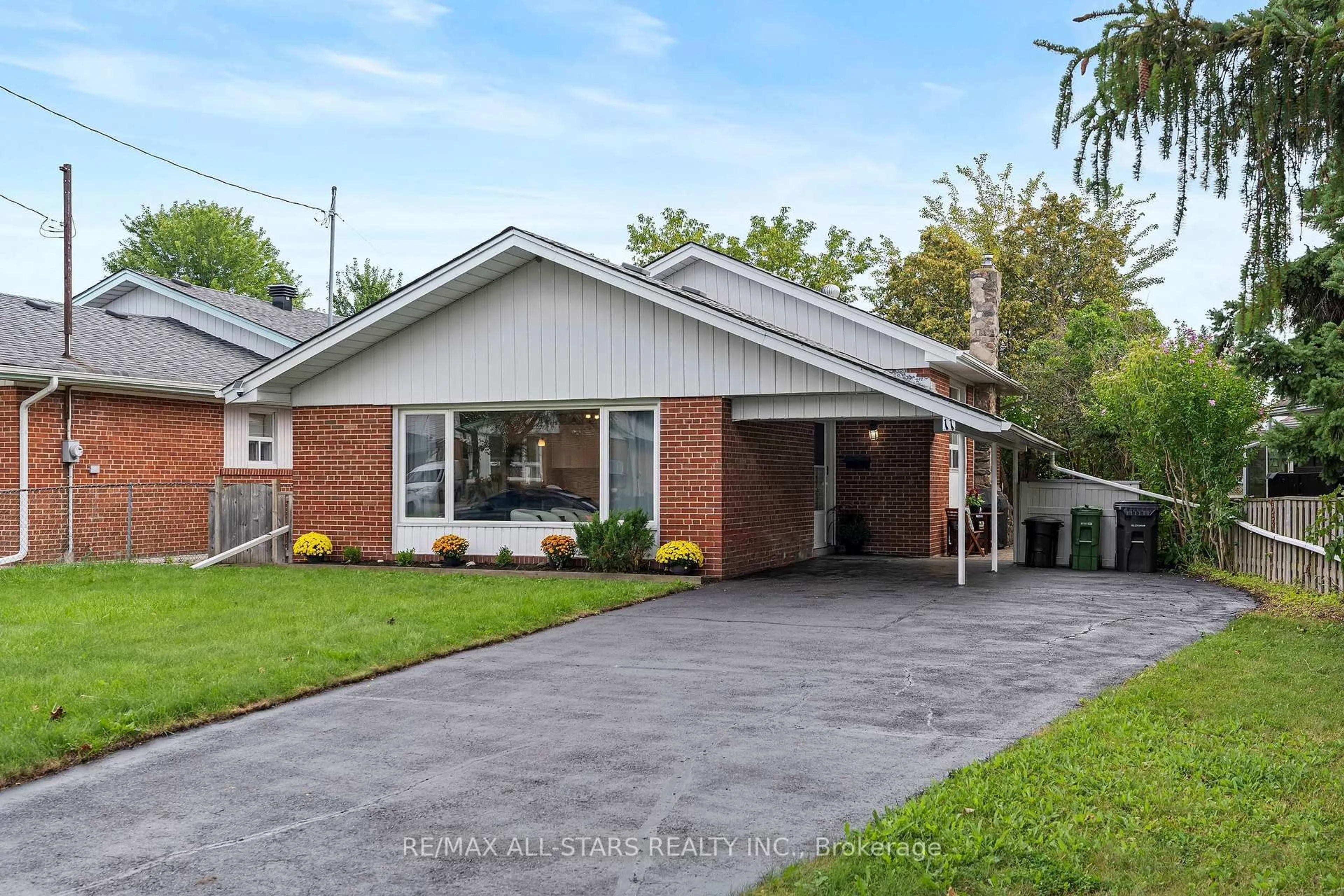 Home with brick exterior material, street for 11 Penzance Dr, Toronto Ontario M1K 4Z4