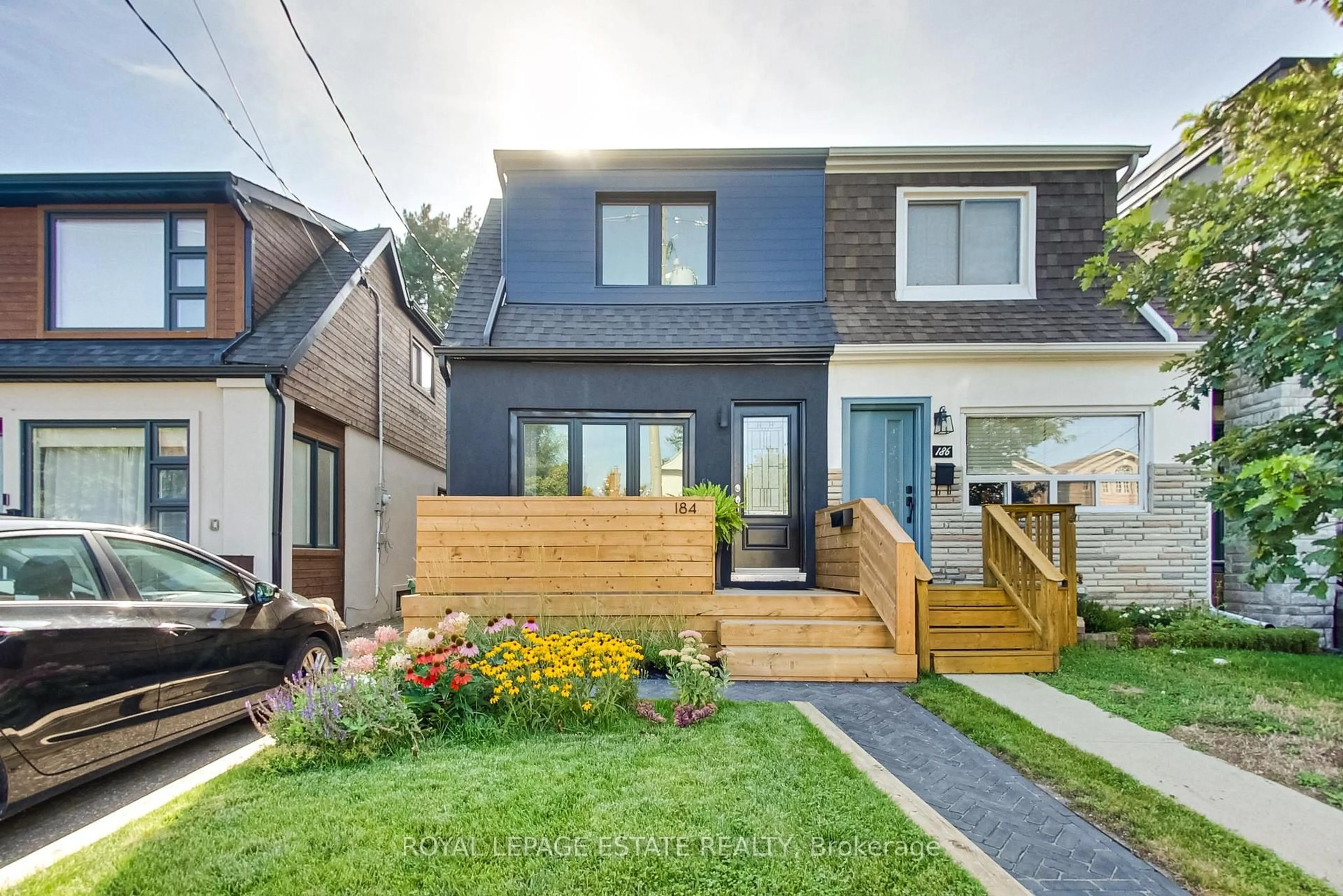 Home with brick exterior material, street for 184 King Edward Ave, Toronto Ontario M4C 5J8