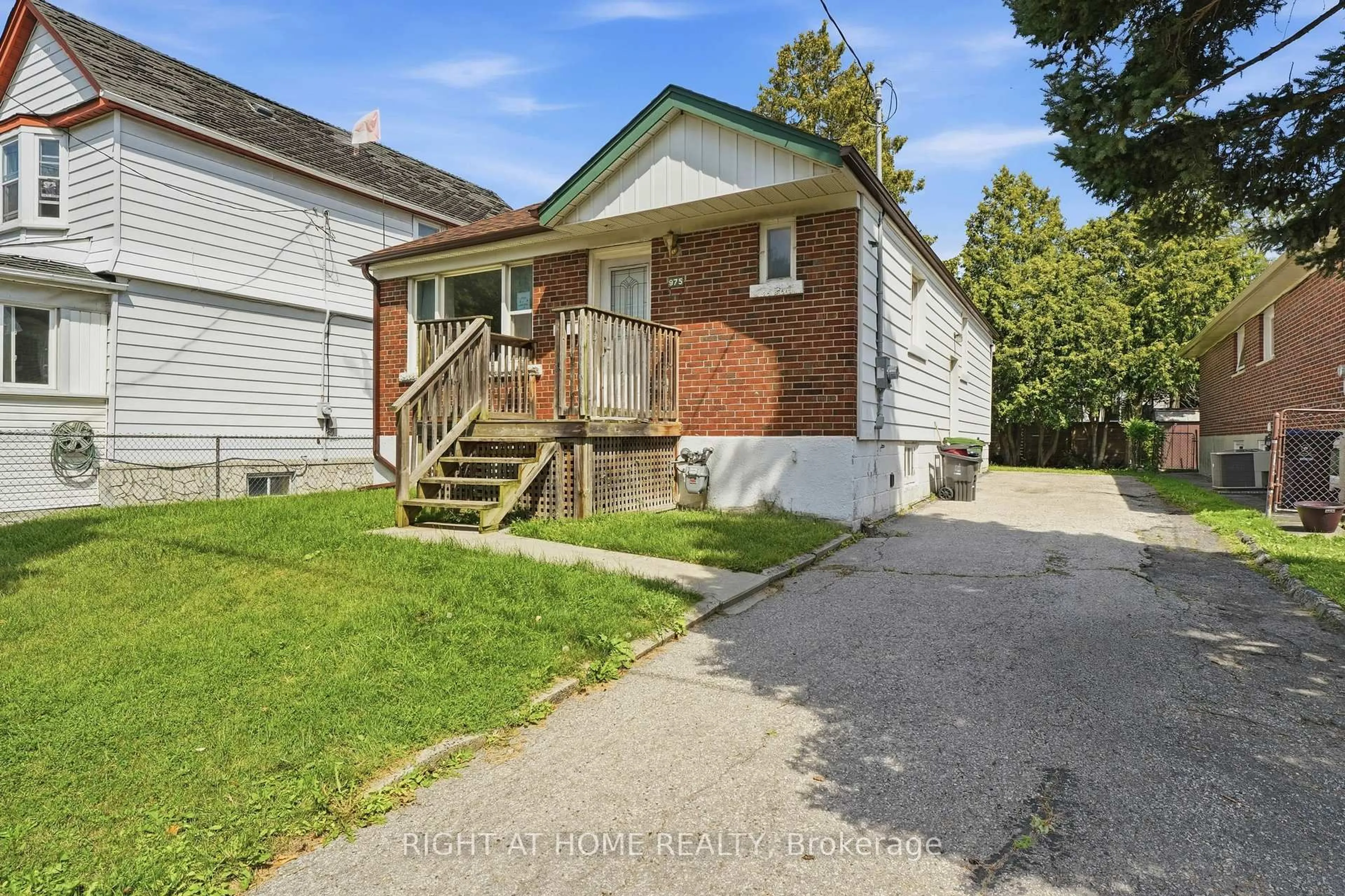 Home with brick exterior material, street for 975 Victoria Park Ave, Toronto Ontario M4B 2J4