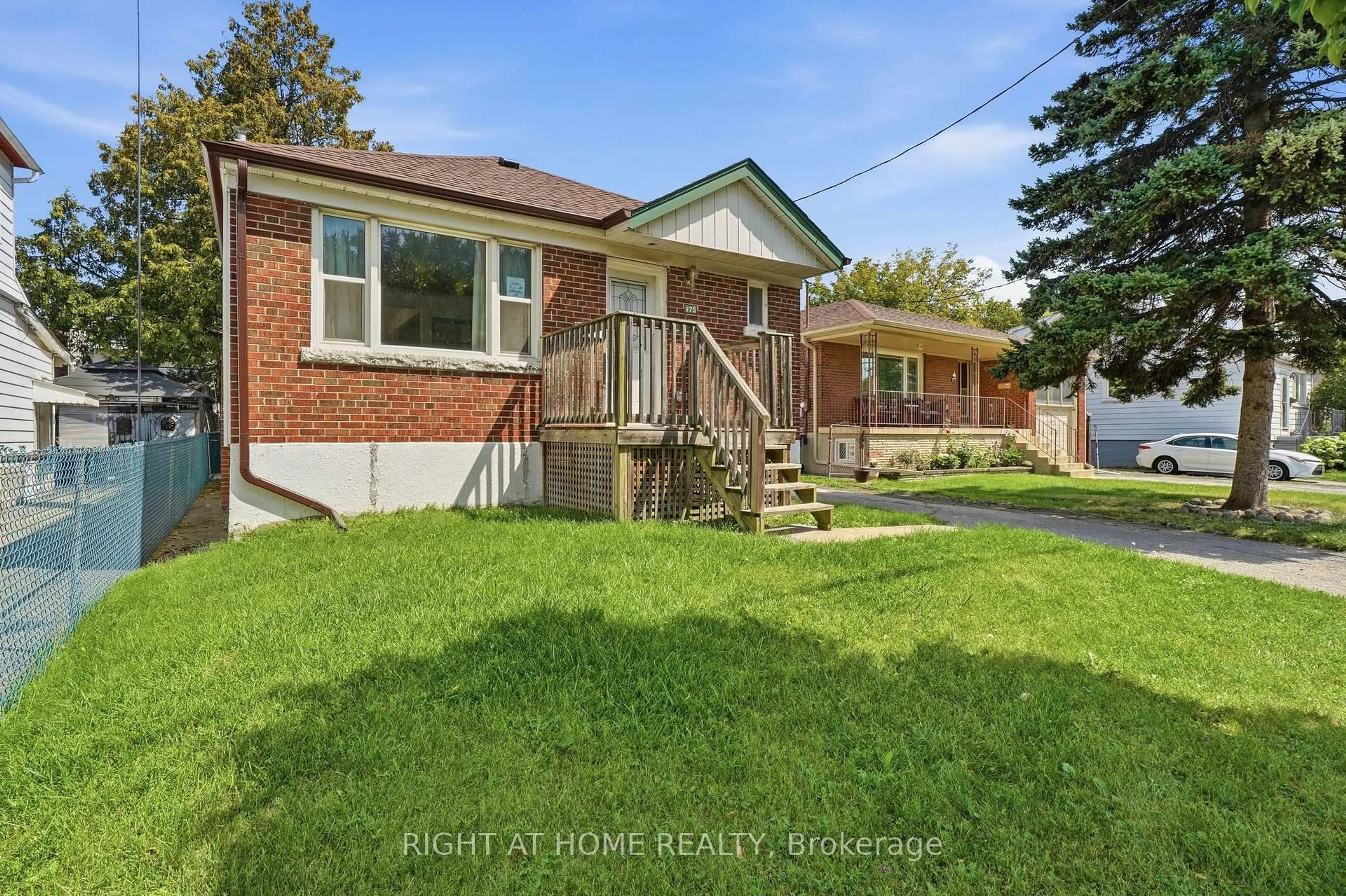 Home with brick exterior material, street for 975 Victoria Park Ave, Toronto Ontario M4B 2J4