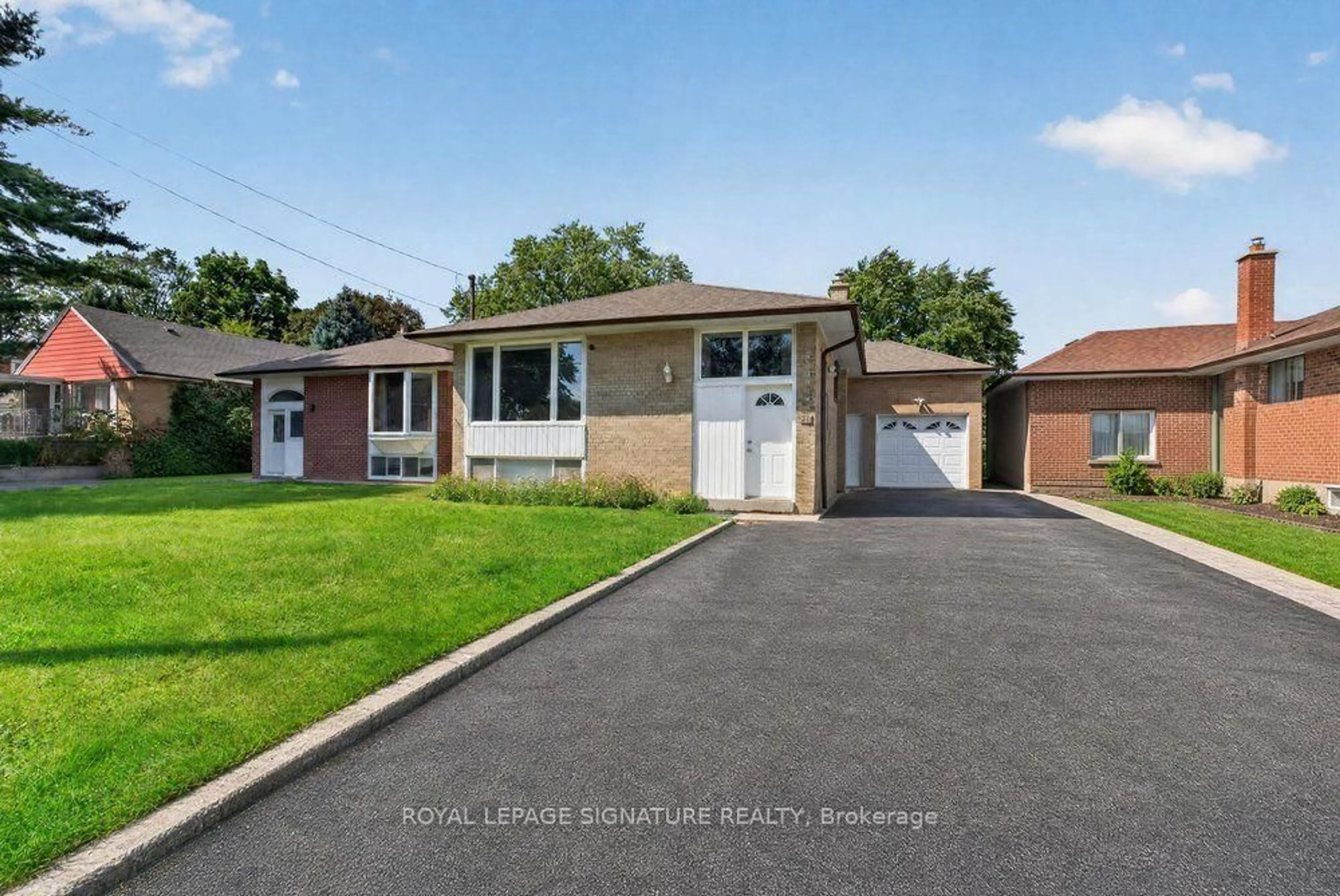 Home with brick exterior material, street for 128 Trinnell Blvd, Toronto Ontario M1L 1S8