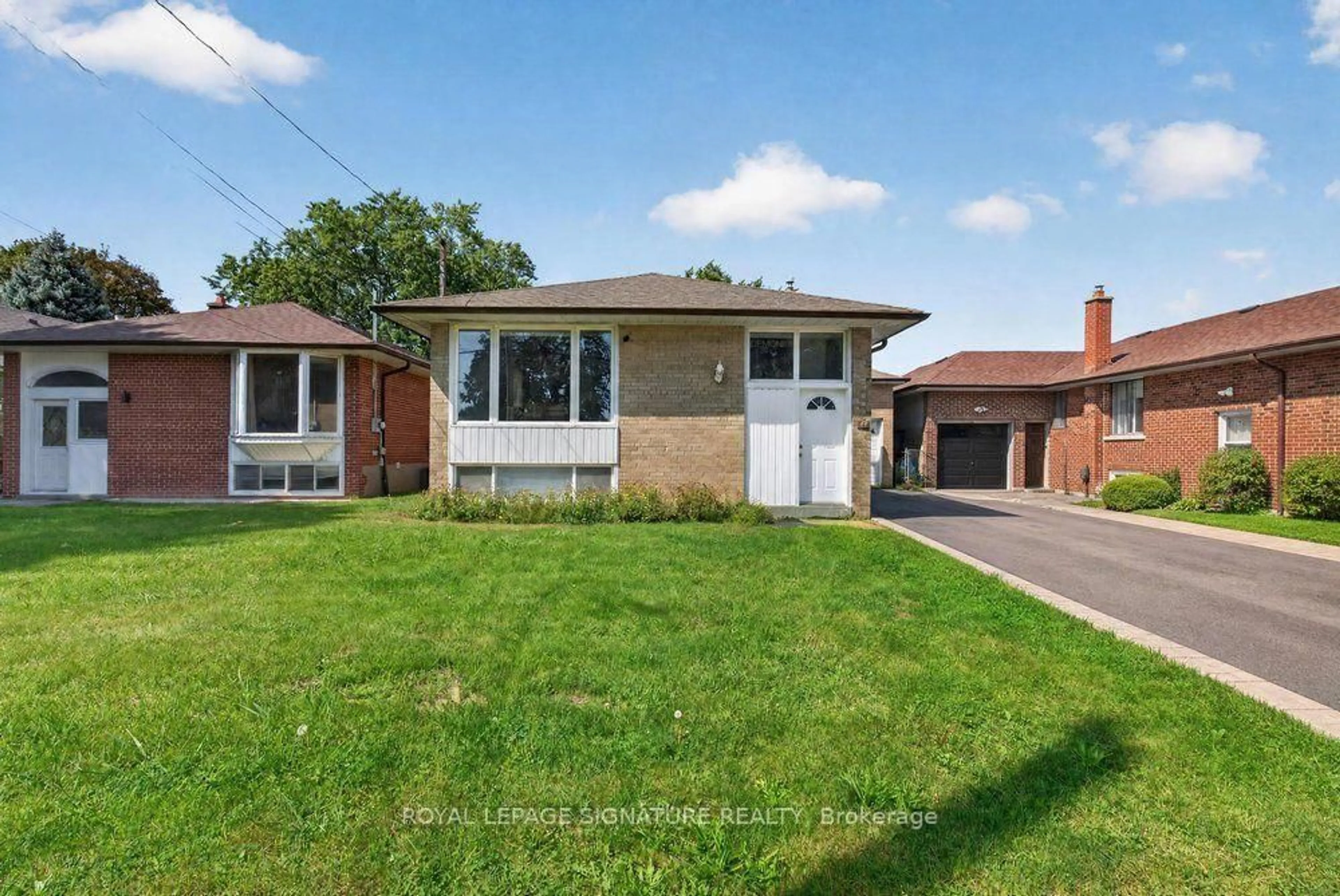 Home with brick exterior material, street for 128 Trinnell Blvd, Toronto Ontario M1L 1S8