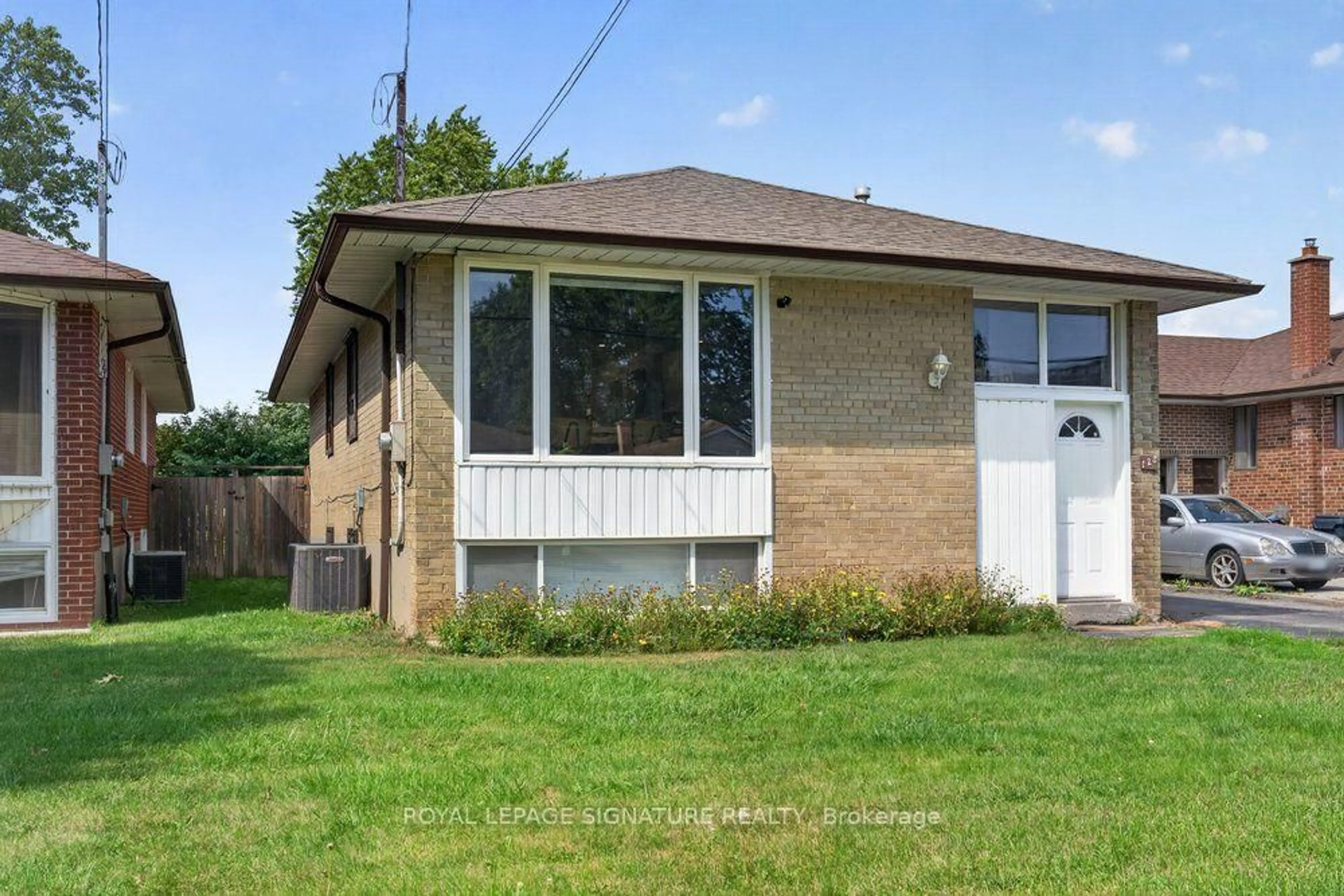 Home with brick exterior material, street for 128 Trinnell Blvd, Toronto Ontario M1L 1S8