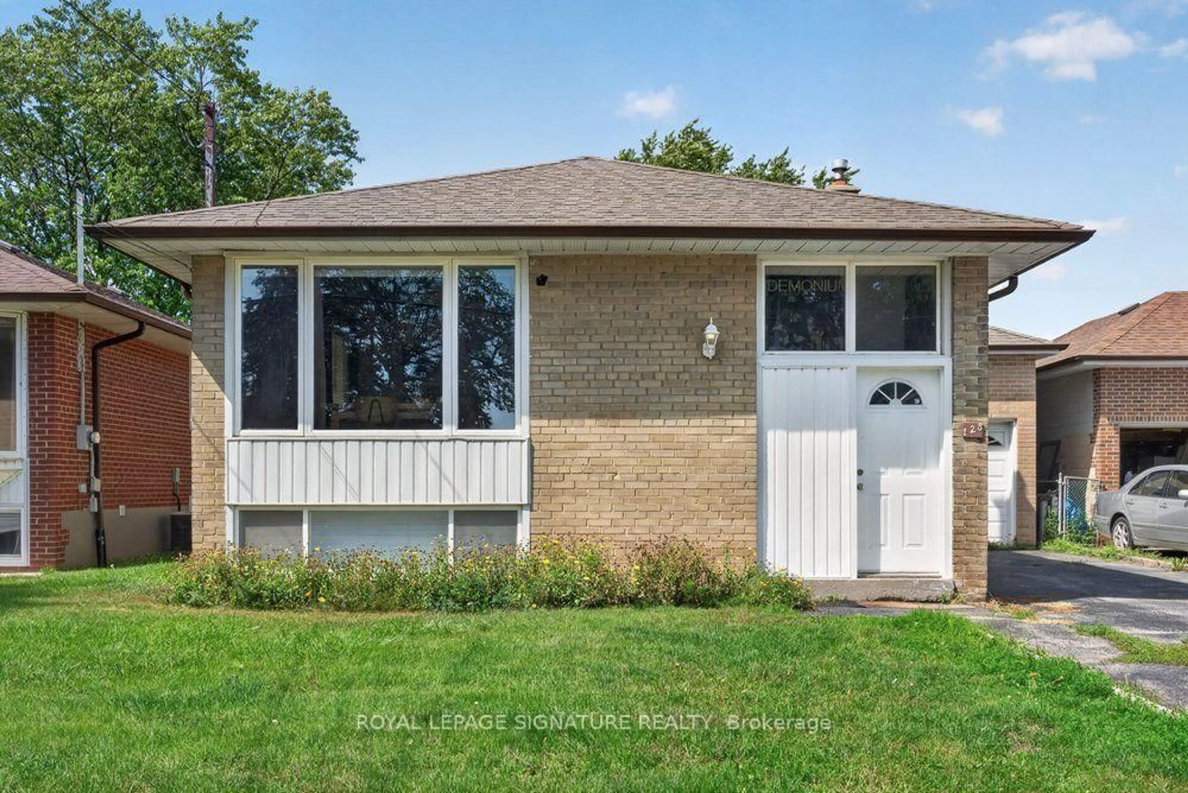 Home with brick exterior material, street for 128 Trinnell Blvd, Toronto Ontario M1L 1S8