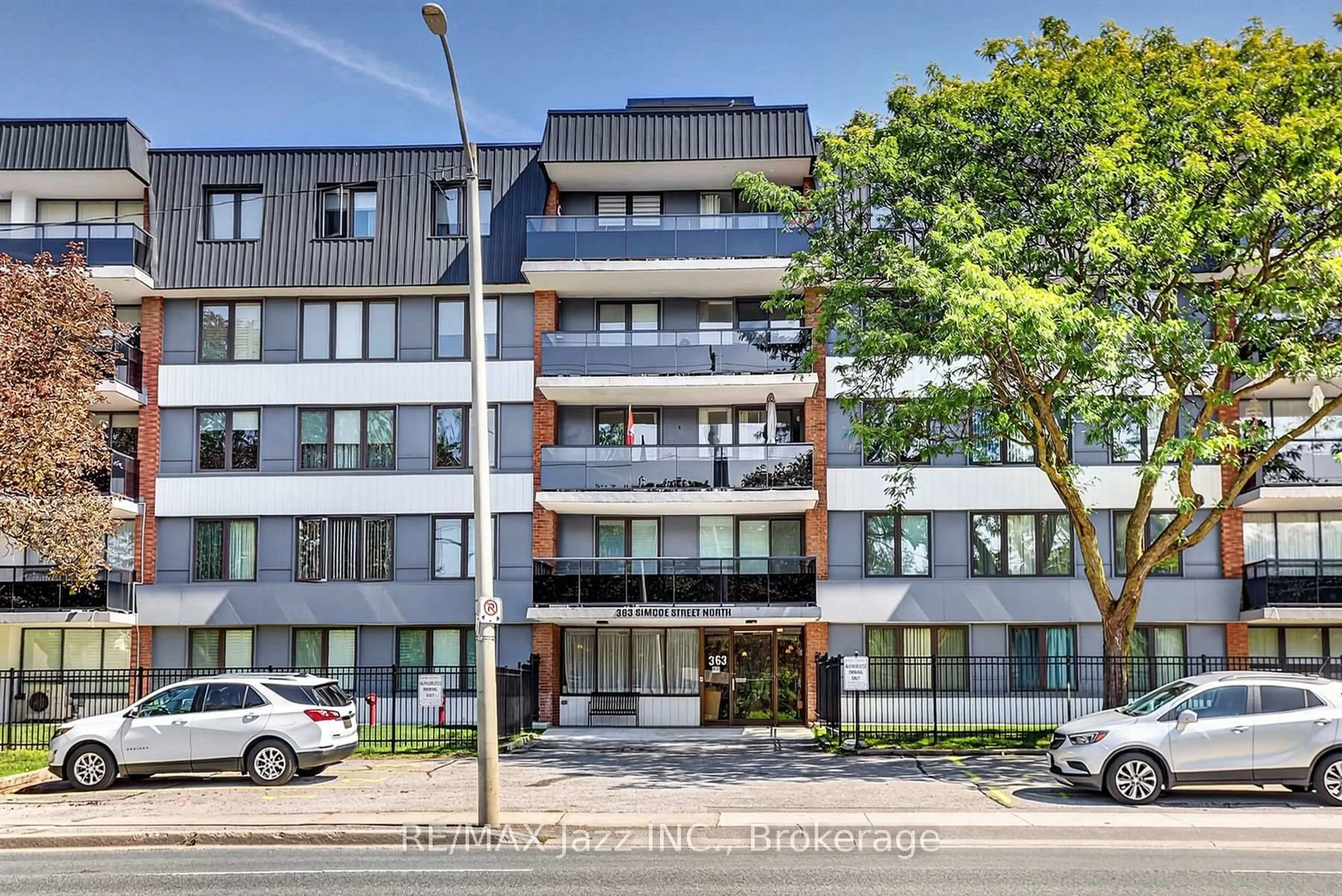 A pic from outside/outdoor area/front of a property/back of a property/a pic from drone, street for 363 Simcoe St #305, Oshawa Ontario L1G 4T2