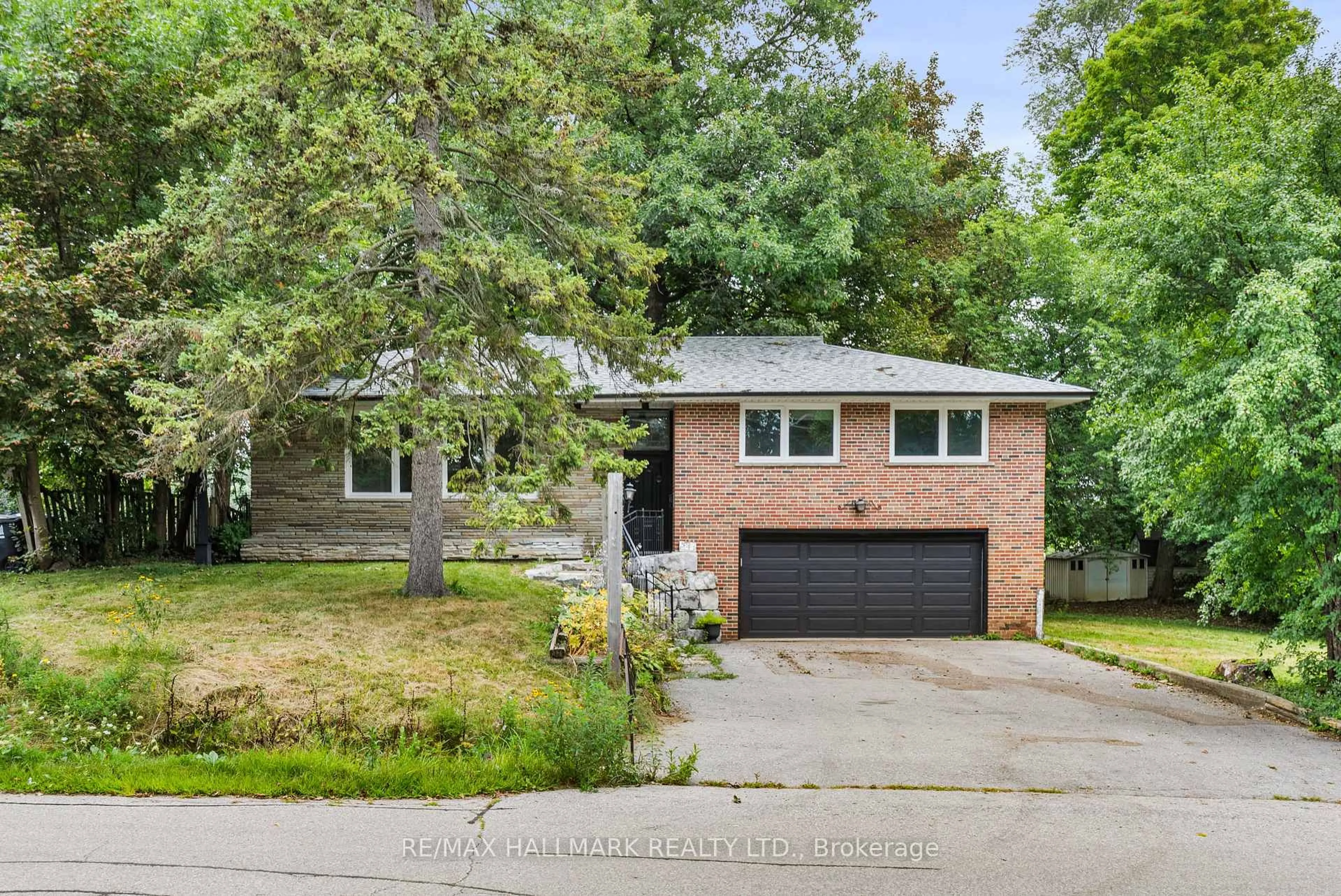 Home with brick exterior material, street for 541 Rouge Hills Dr, Toronto Ontario M1C 2Z9