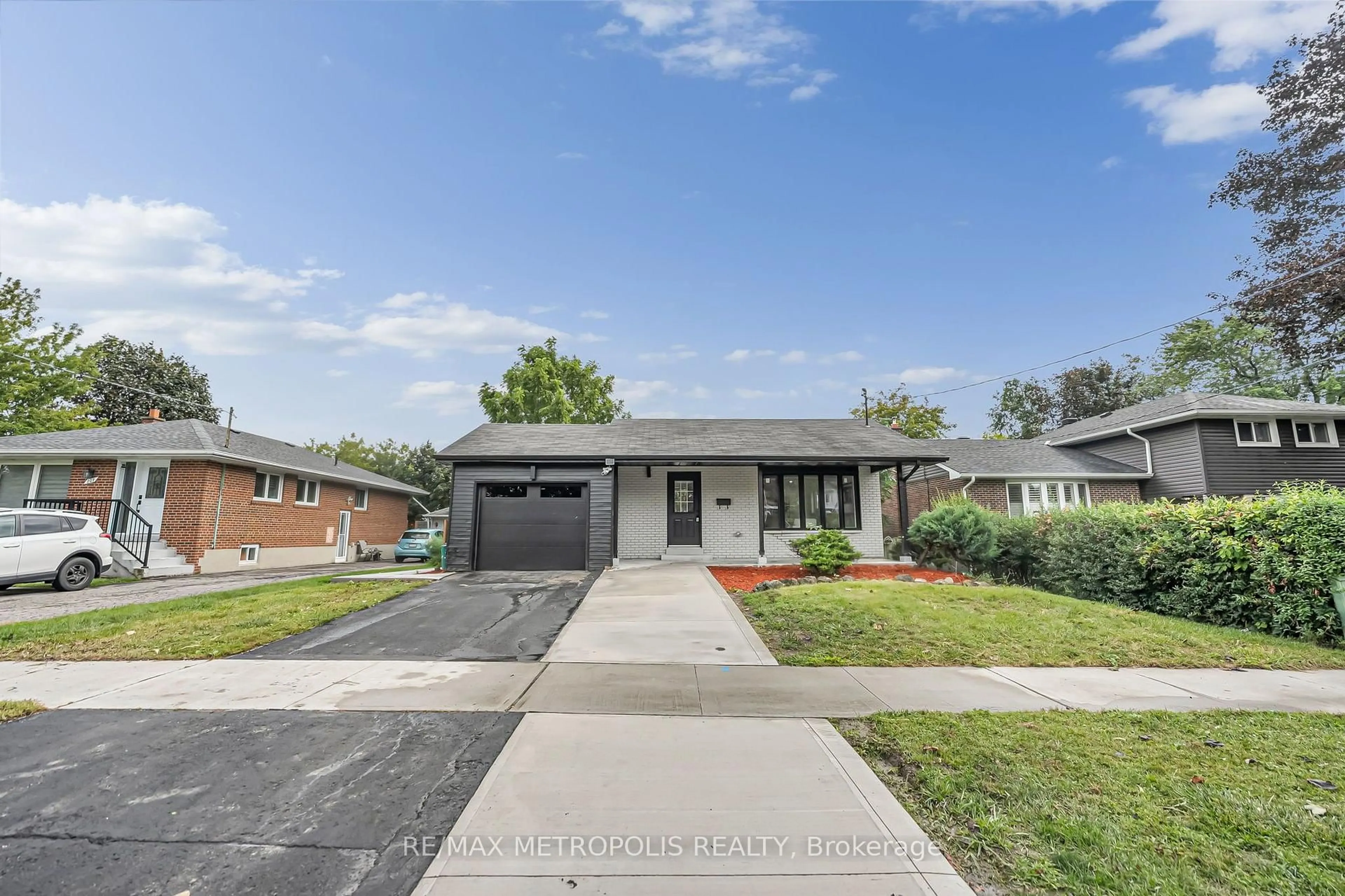 Home with brick exterior material, street for 205 Clemence Ave, Whitby Ontario L1N 1E7