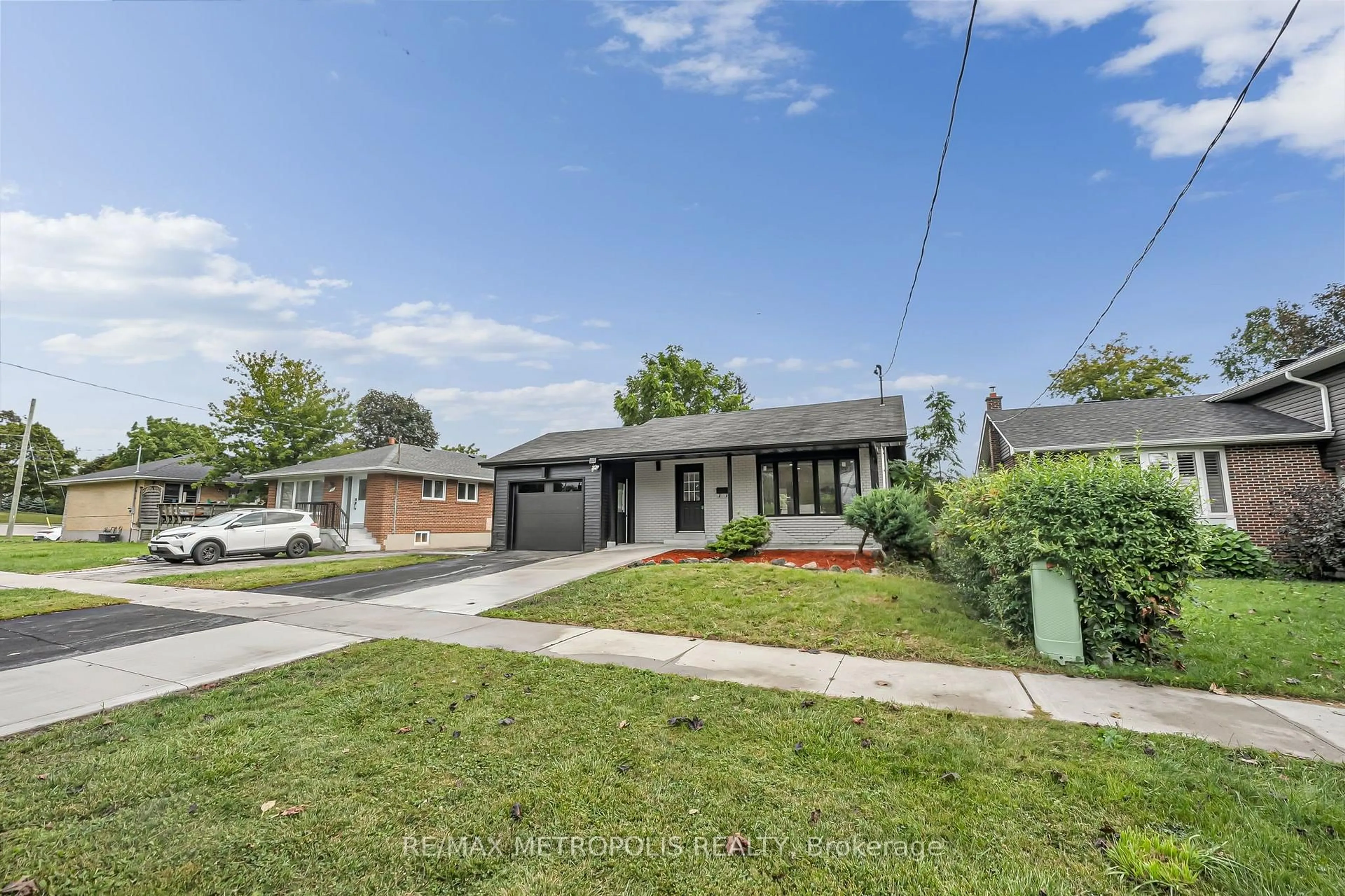 A pic from outside/outdoor area/front of a property/back of a property/a pic from drone, street for 205 Clemence Ave, Whitby Ontario L1N 1E7