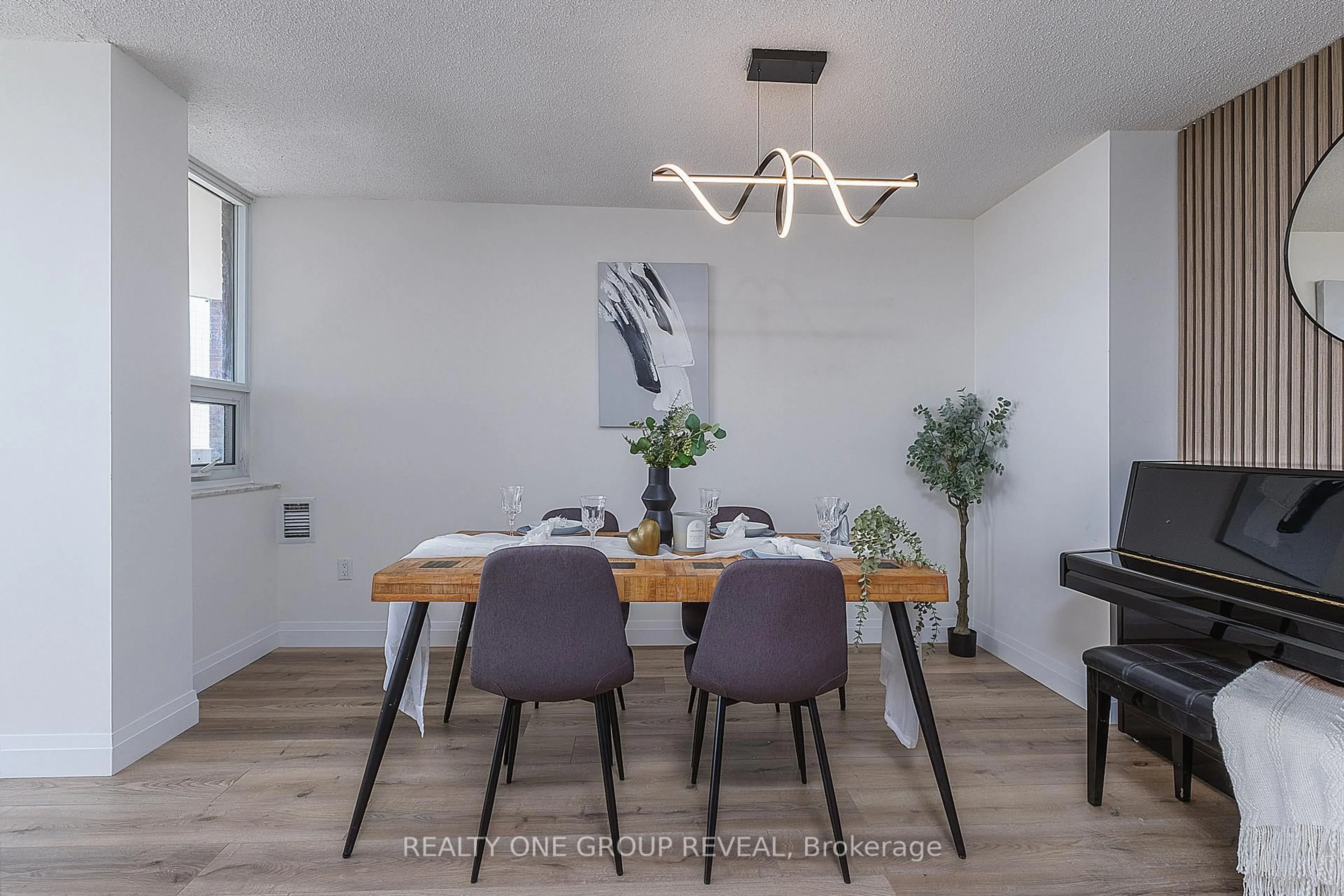 Dining room, wood/laminate floor for 121 Ling Rd #1509, Toronto Ontario M1E 4Y2