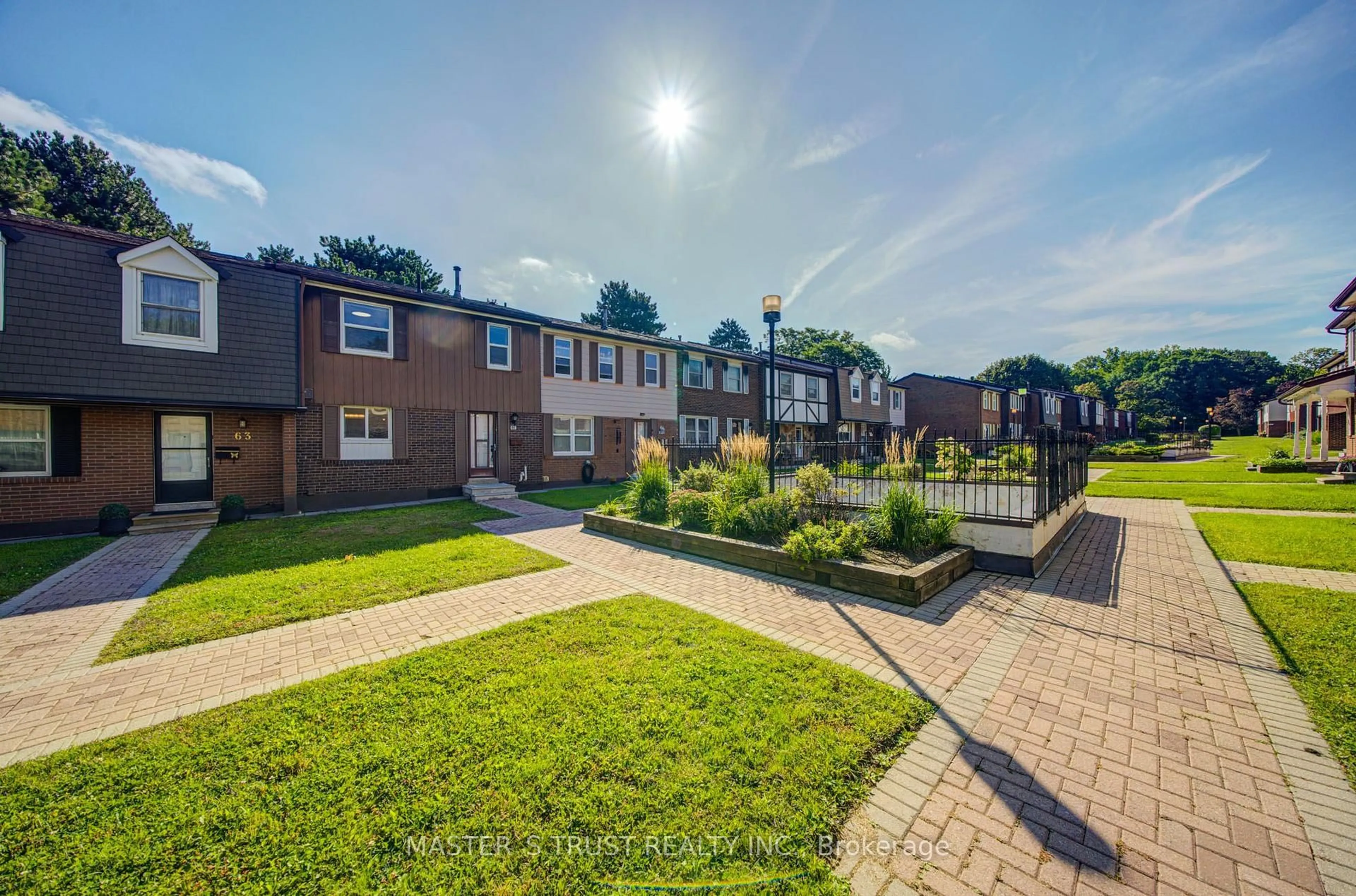 A pic from outside/outdoor area/front of a property/back of a property/a pic from drone, street for 15 Brimwood Blvd #61, Toronto Ontario M1V 1E1
