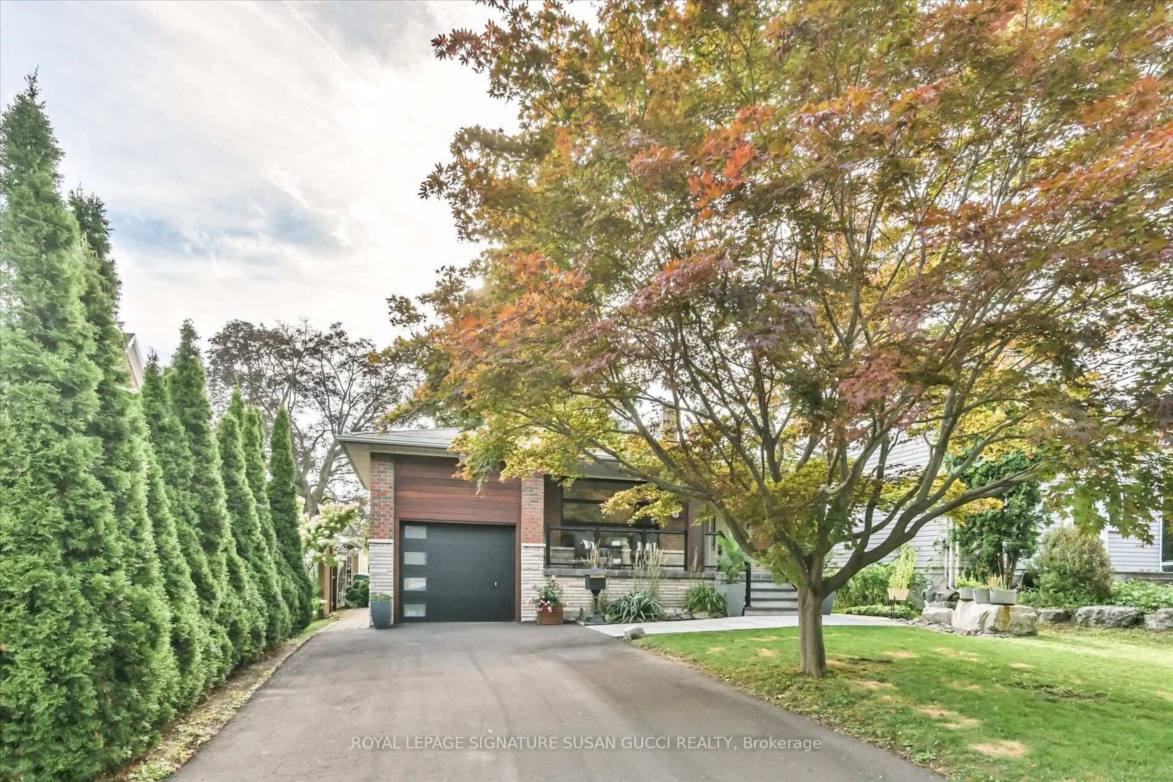 Home with brick exterior material, street for 16 Squires Ave, Toronto Ontario M4B 2R3