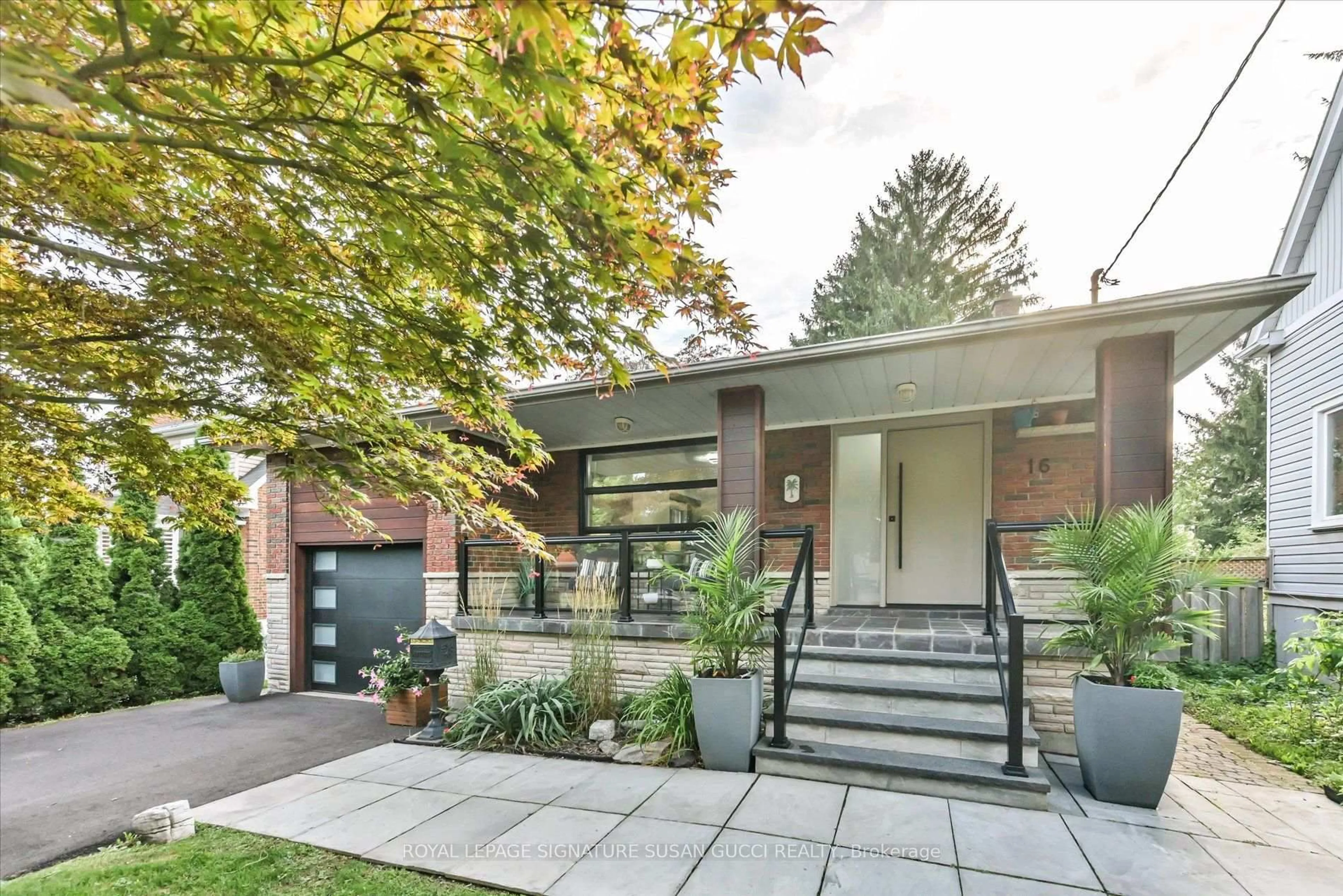 Home with brick exterior material, street for 16 Squires Ave, Toronto Ontario M4B 2R3