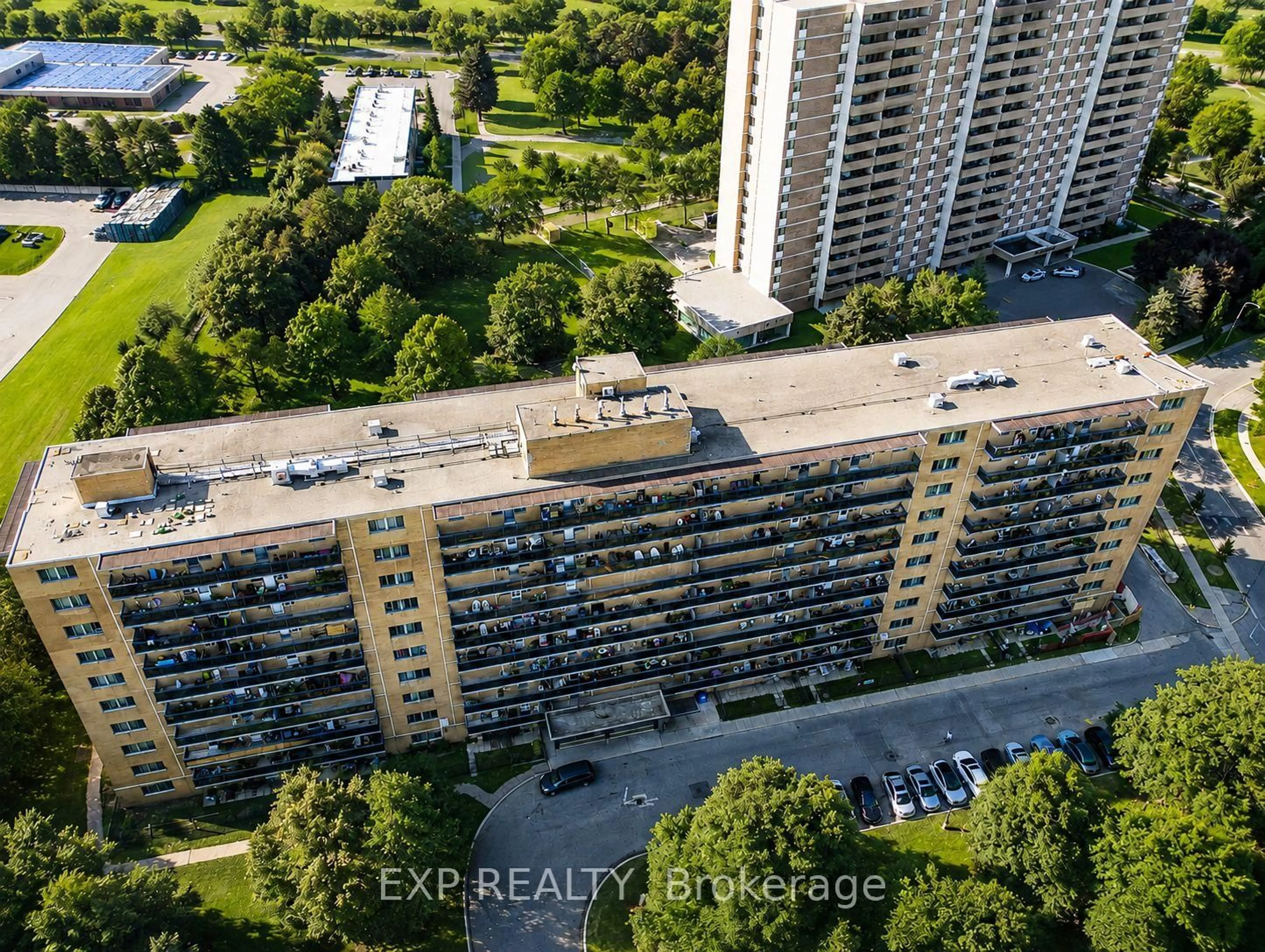 A pic from outside/outdoor area/front of a property/back of a property/a pic from drone, city buildings view from balcony for 100 Dundalk Dr #507, Toronto Ontario M1P 4V2