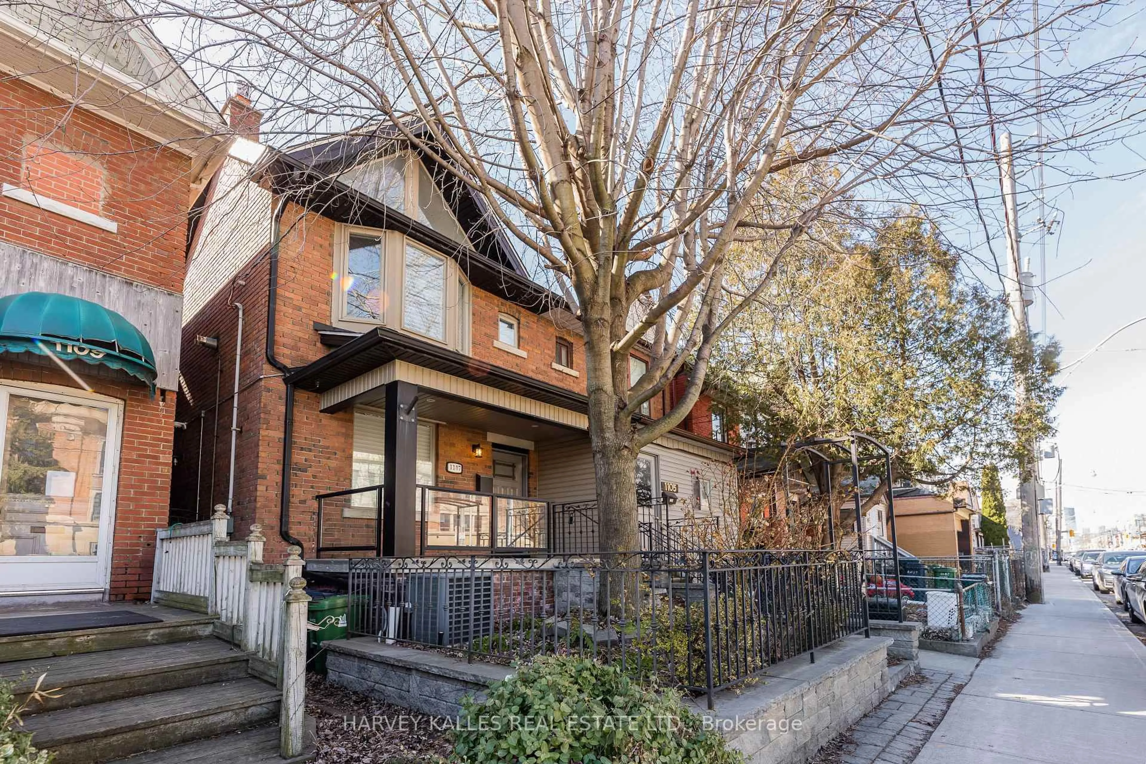 Home with brick exterior material, street for 1107 Gerrard St, Toronto Ontario M4M 1Z9