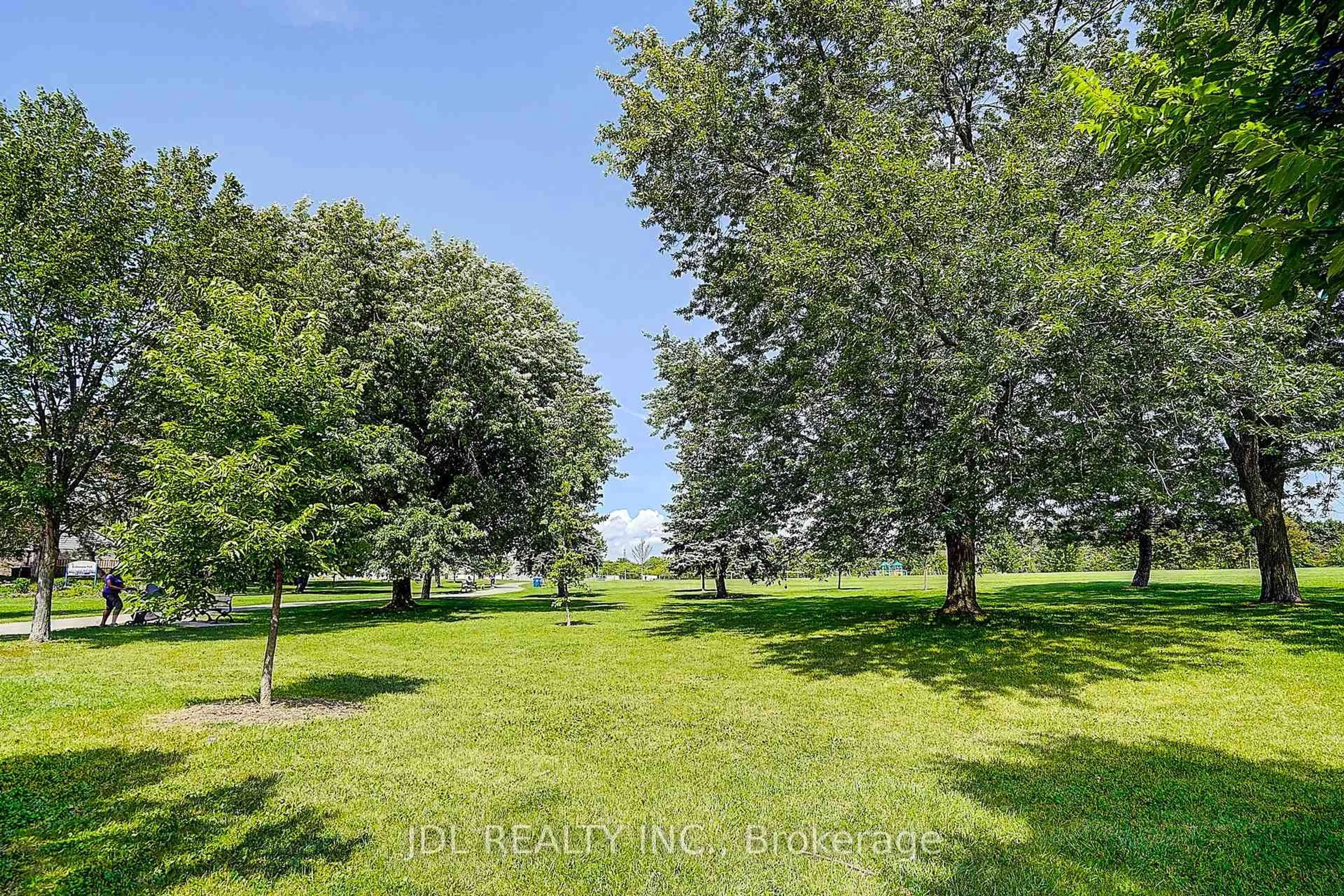 A pic from outside/outdoor area/front of a property/back of a property/a pic from drone, forest/trees view for 2100 Bridletowne Circ #316, Toronto Ontario M1W 2L1