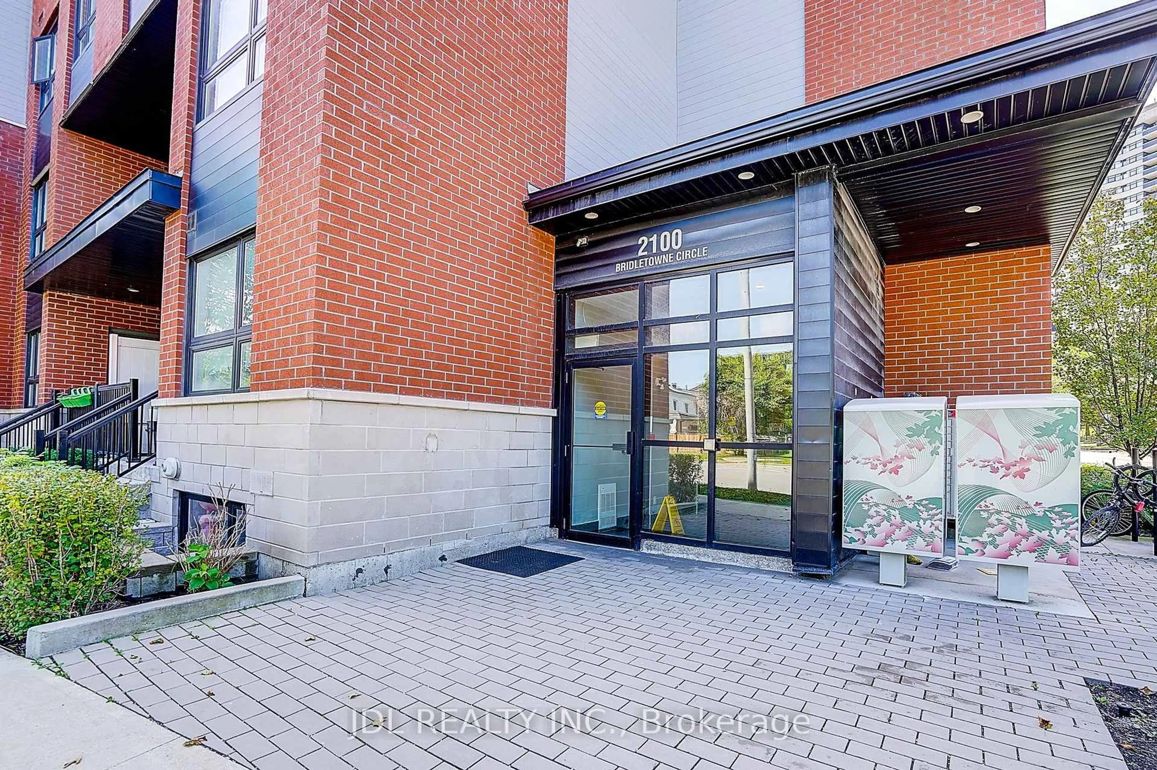 Home with brick exterior material, building for 2100 Bridletowne Circ #316, Toronto Ontario M1W 2L1