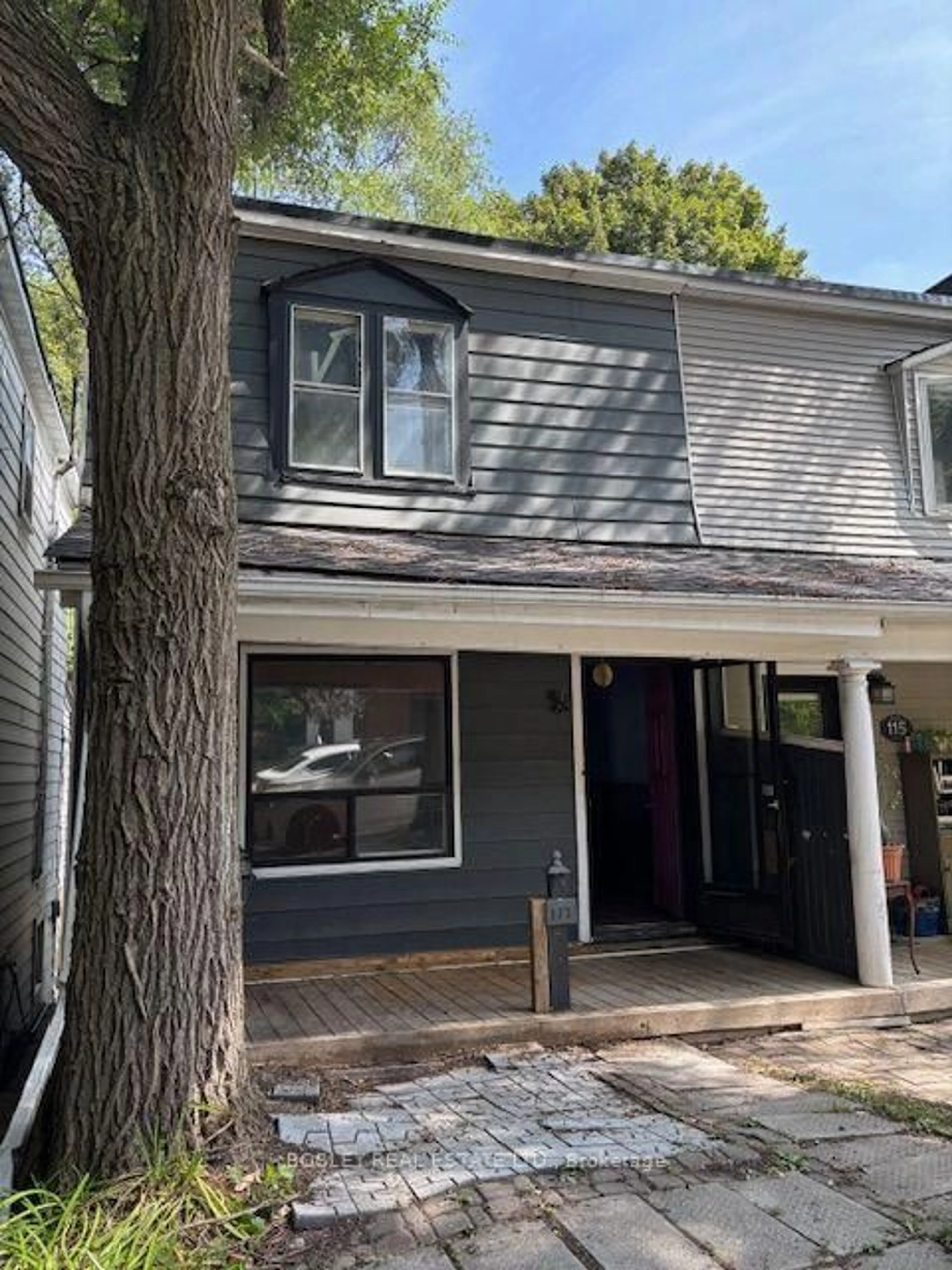 Home with vinyl exterior material, street for 117 Wheeler Ave, Toronto Ontario M4L 3V3