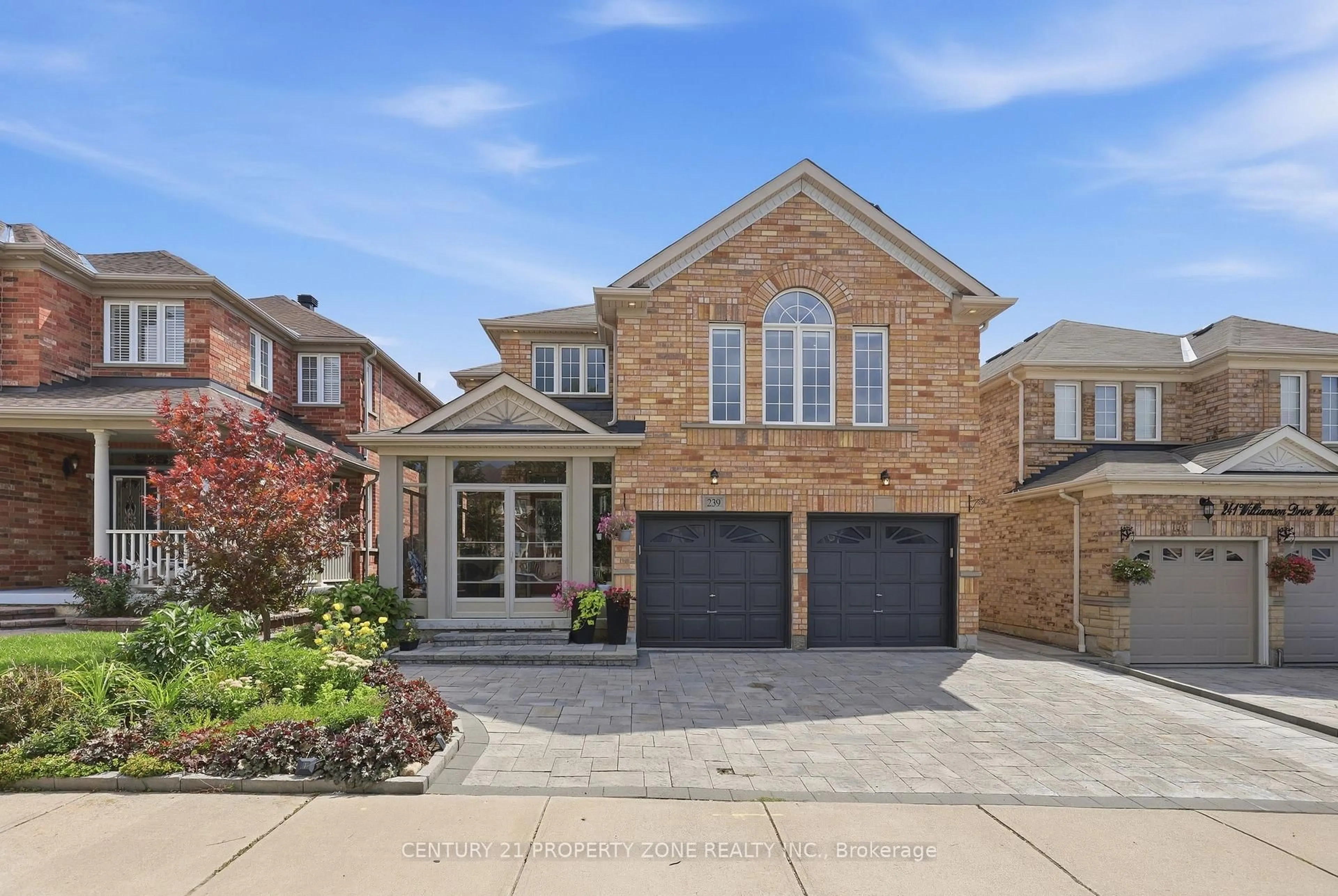 Home with brick exterior material, street for 239 Williamson Dr, Ajax Ontario L1T 5A2