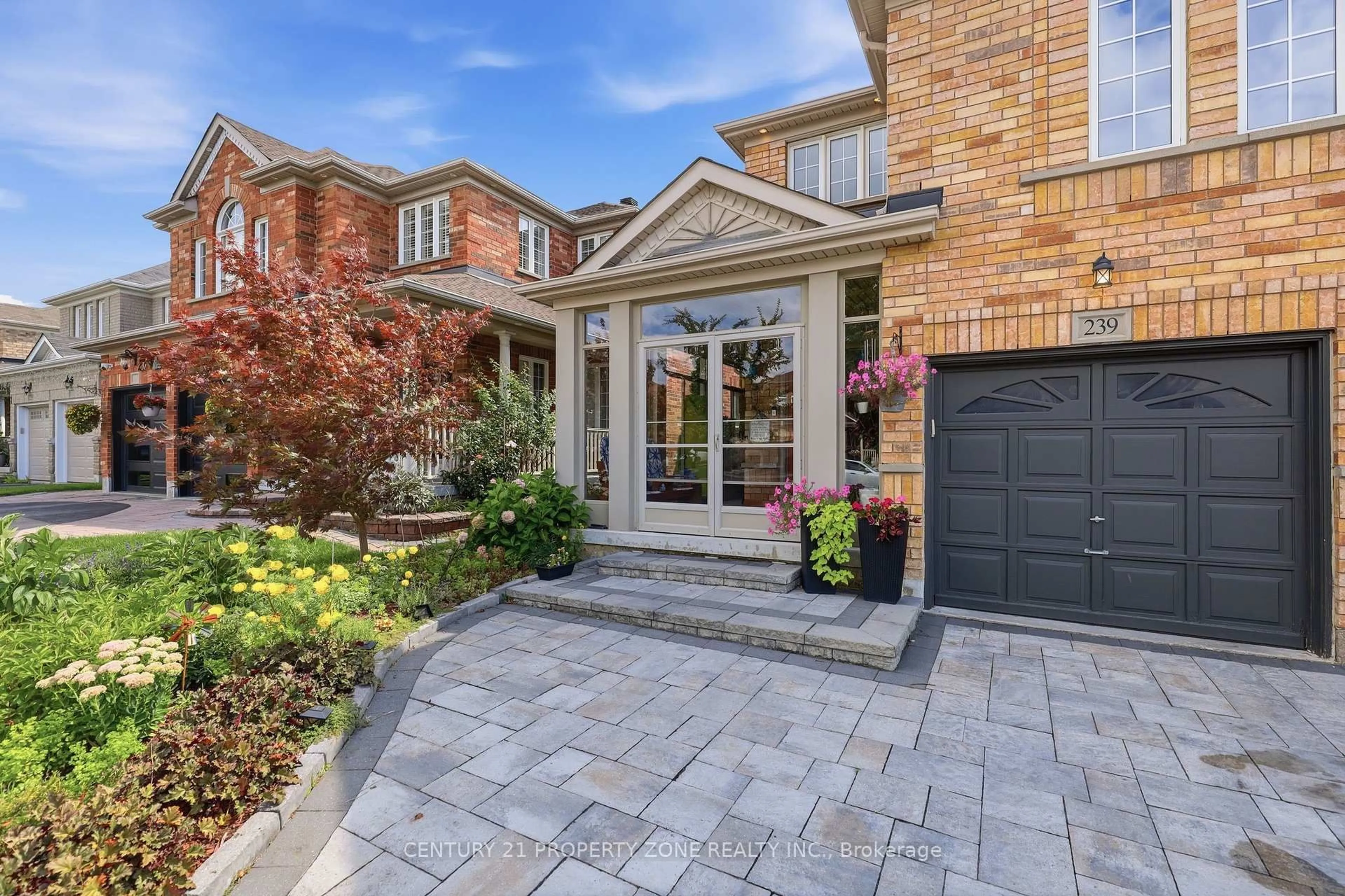 Home with brick exterior material, street for 239 Williamson Dr, Ajax Ontario L1T 5A2