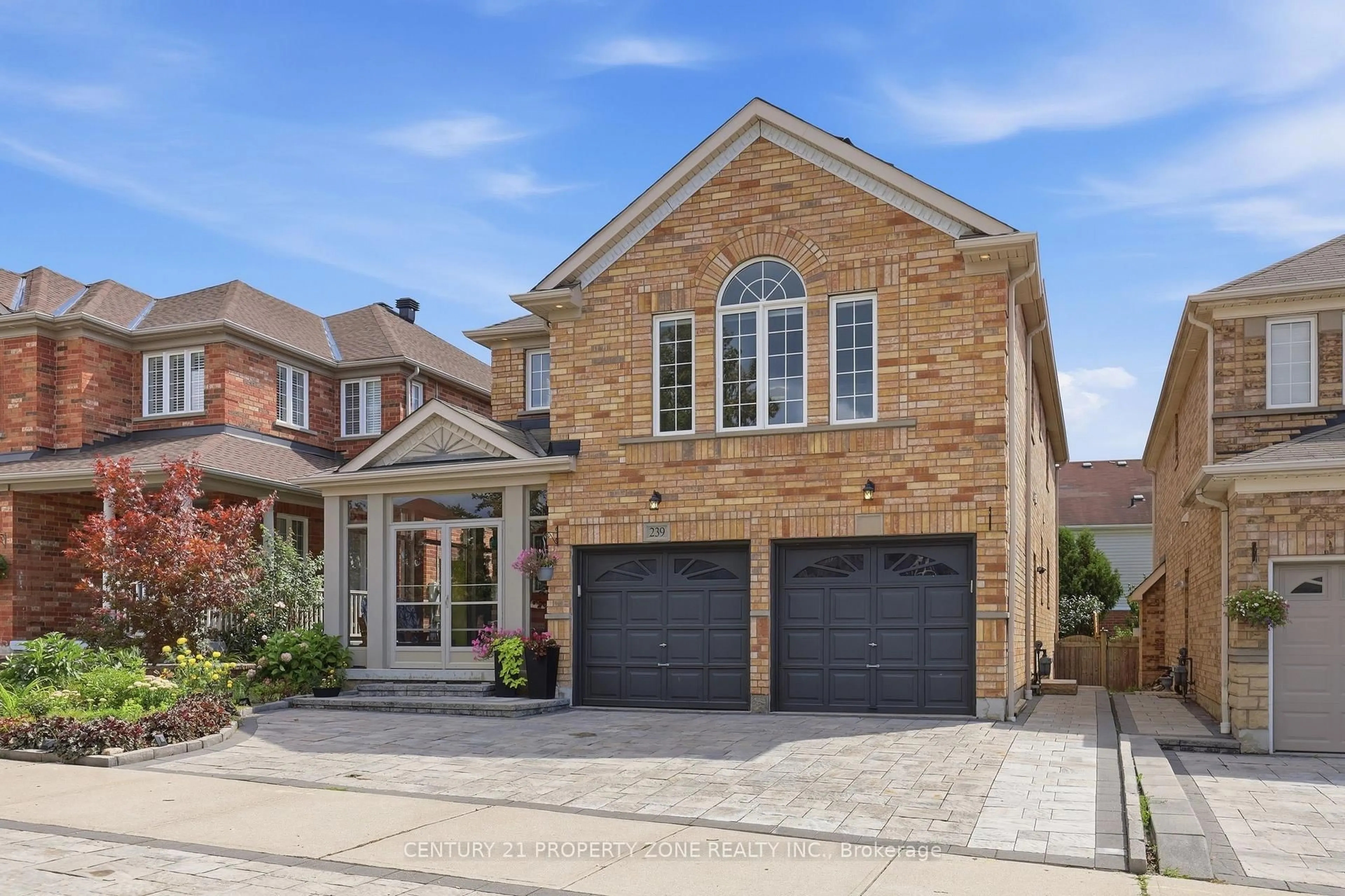 Home with brick exterior material, street for 239 Williamson Dr, Ajax Ontario L1T 5A2