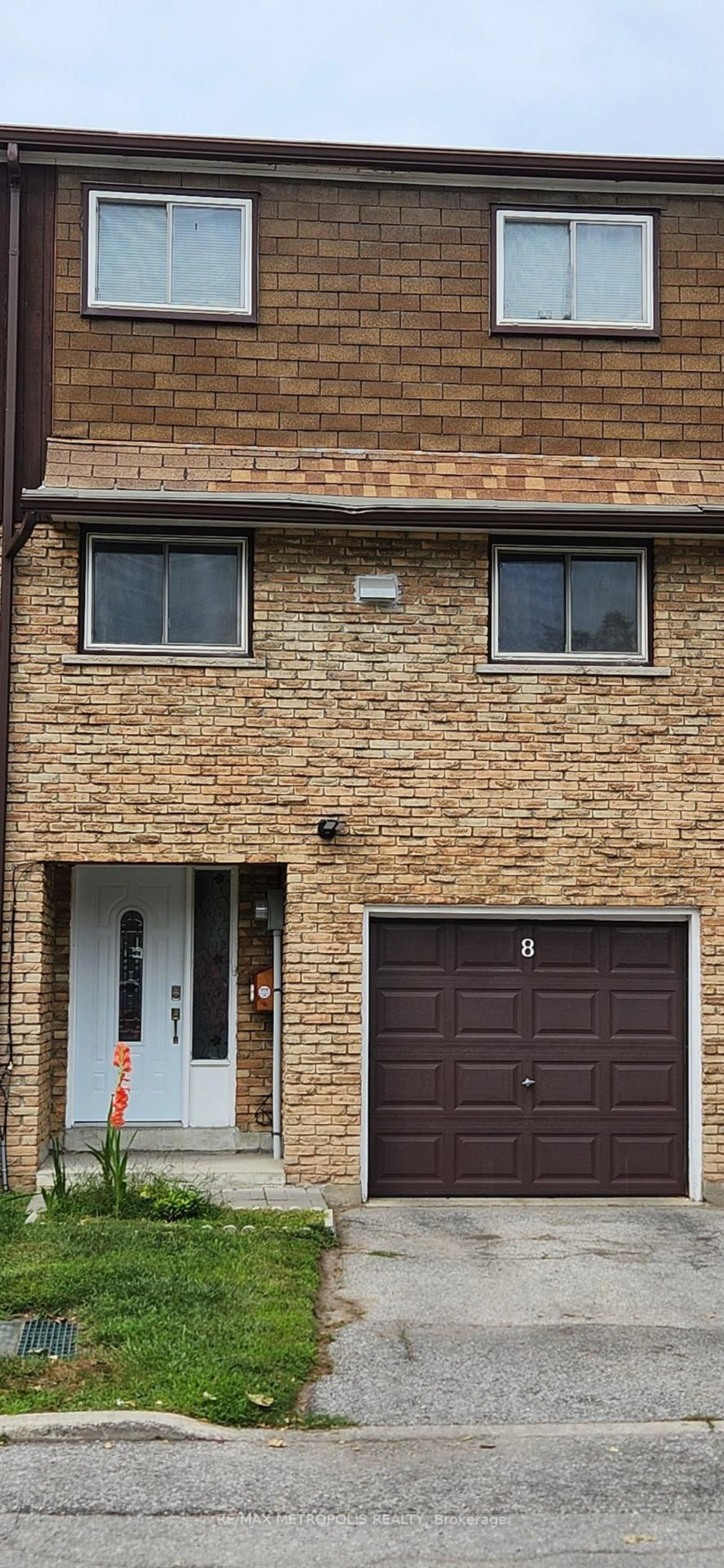 Home with brick exterior material, street for 21 Rockwood Dr #8, Toronto Ontario M1M 3M9