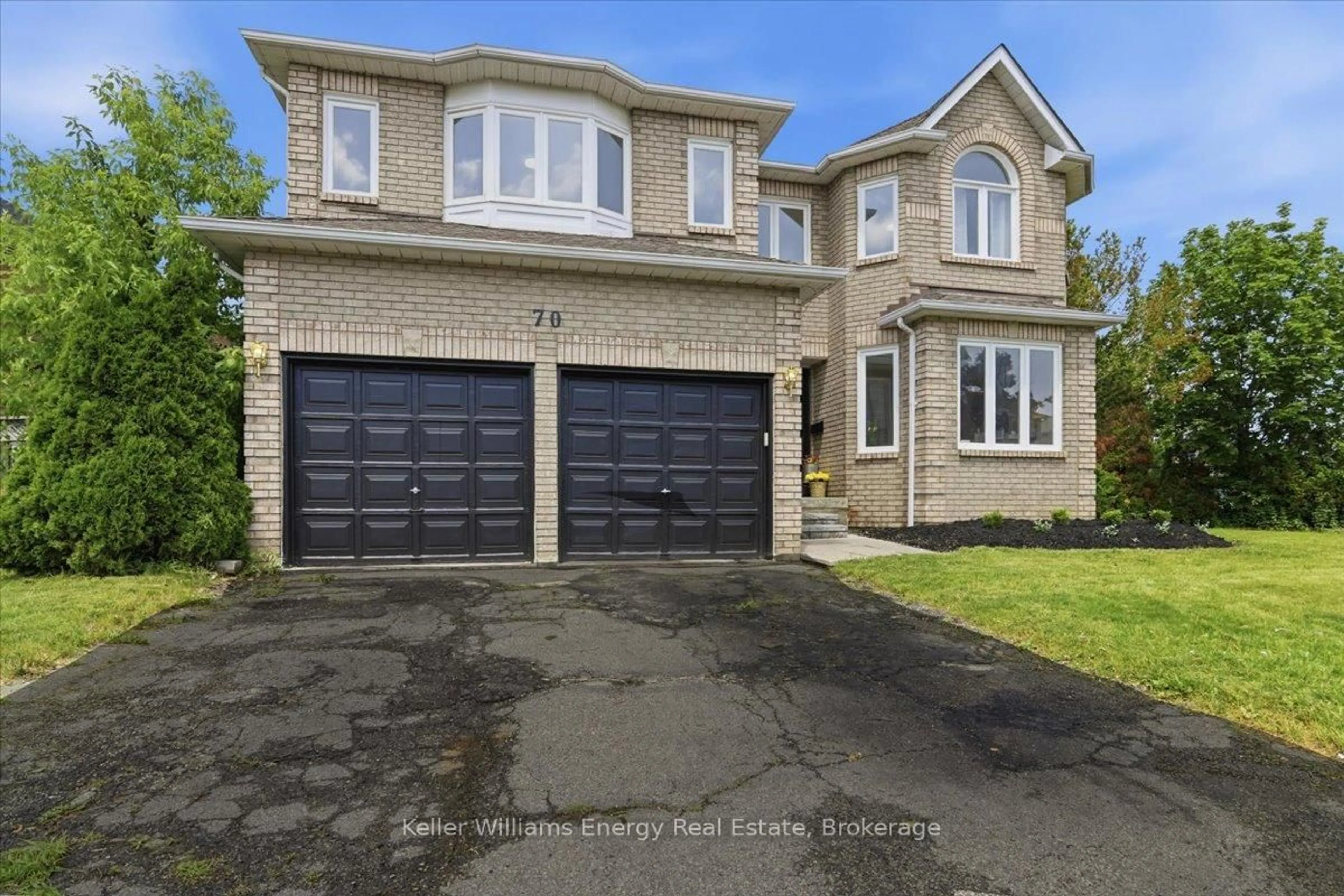 Home with brick exterior material, street for 70 Willowbrook Dr, Whitby Ontario L1R 2A8